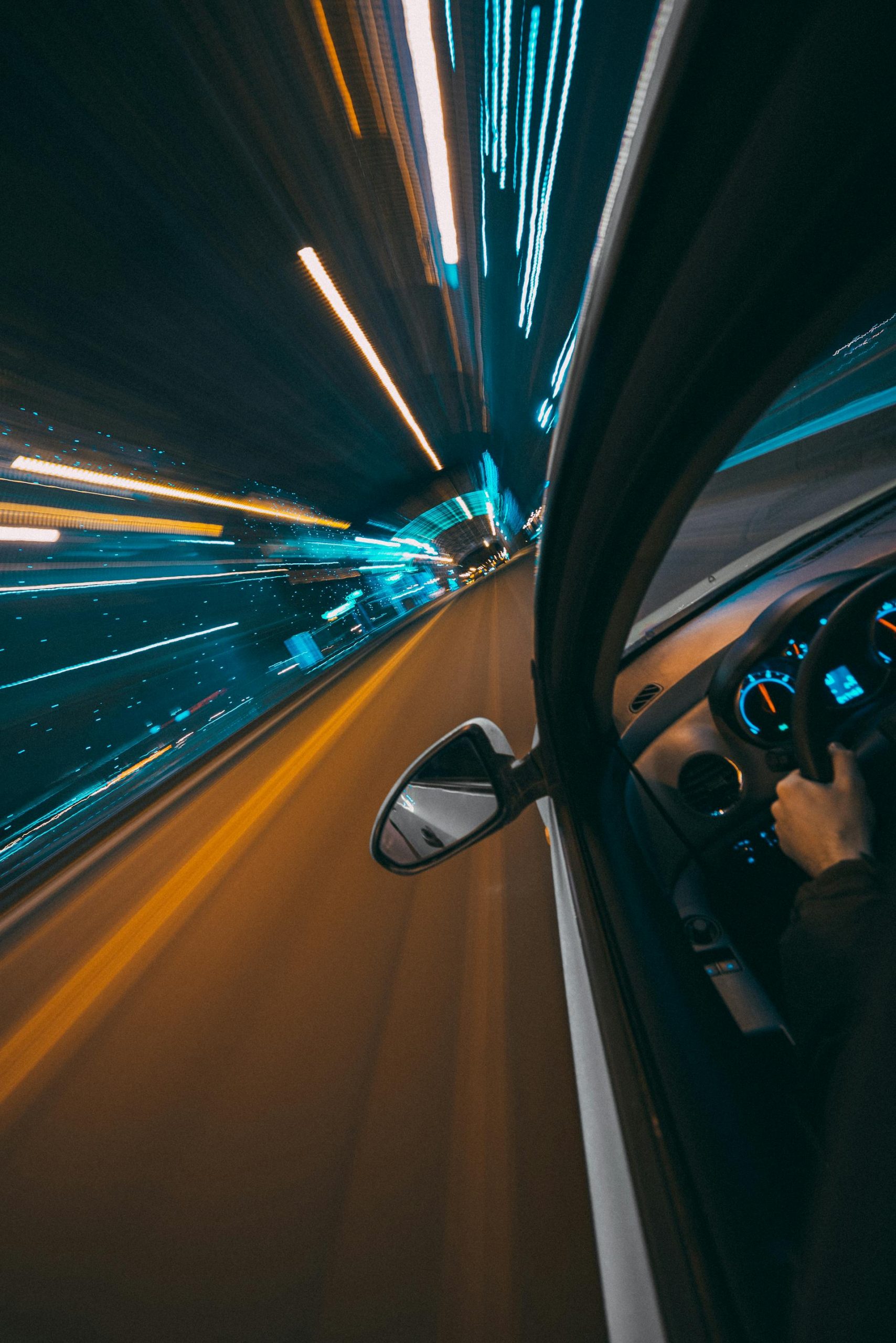 A close-up shot of a fast-moving car on the road | Source: Pexels