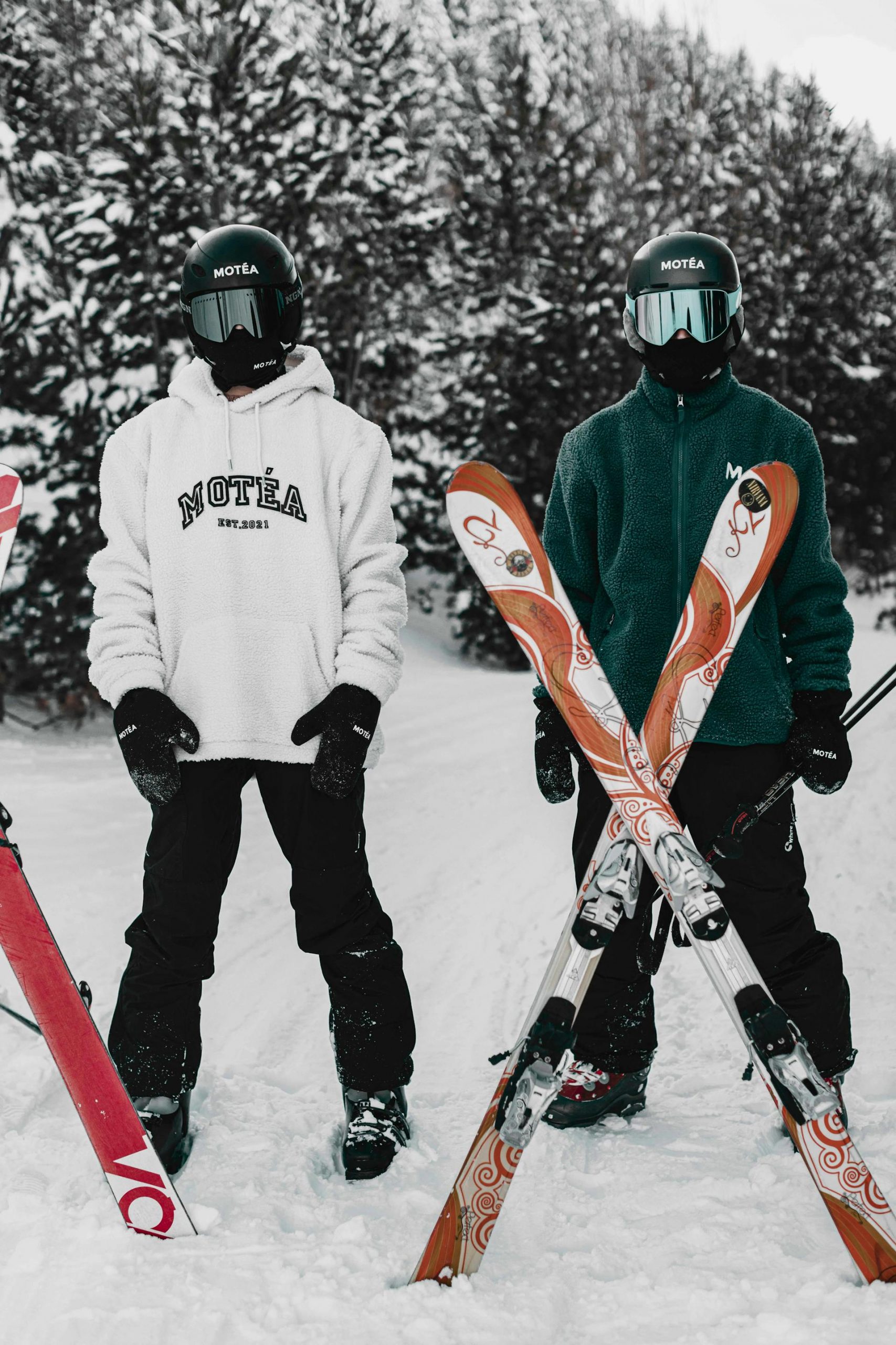 Two skiers standing in the snow | Source: Pexels