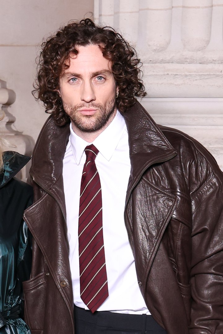 Aaron Taylor-Johnson at the Saint Laurent Men's Fall/Winter 2026 fashion show as part of Paris Men's Fashion Week held at Bourse du Commerce on 27 January 2026 in Paris, France. | Source: Getty Images