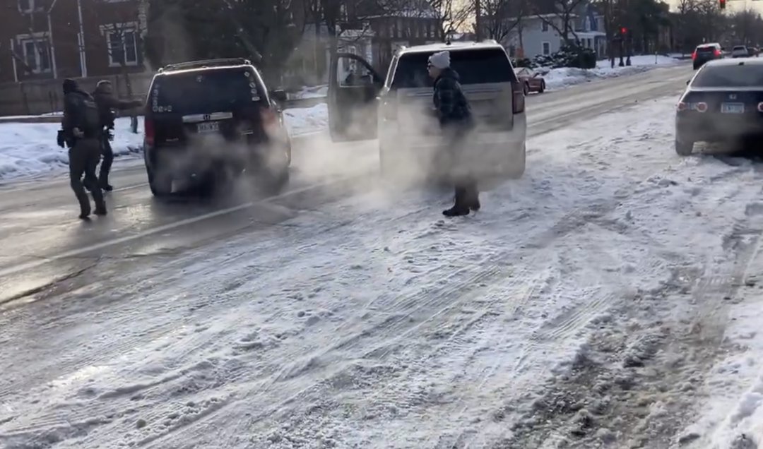 An ICE agent is seen pointing his gun at Renee Nicole Good as she attempts to drive away on January 7, 2026 | Source: X/maxnesterak