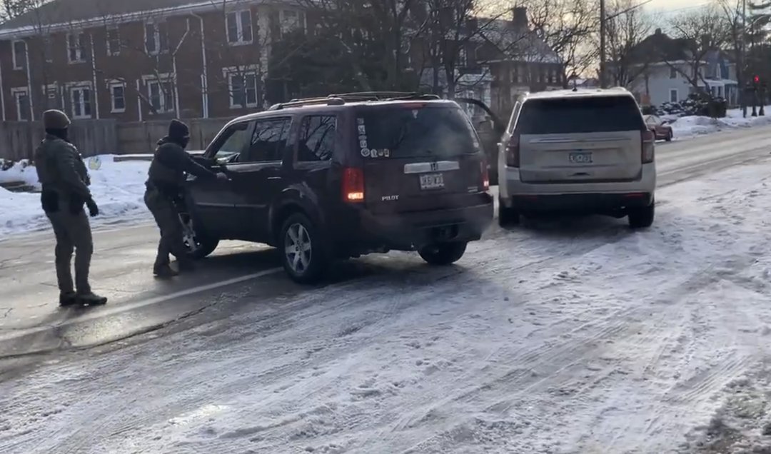 An ICE agent is seen trying to yank Renee Nicole Good's door open on January 7, 2026 | Source: X/maxnesterak