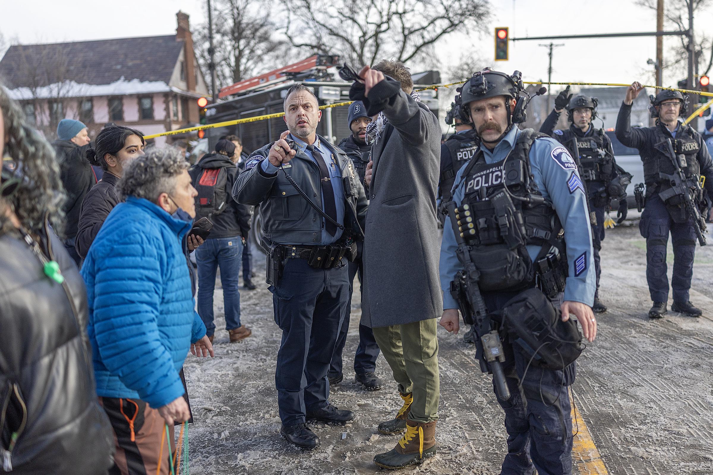 Law enforcement officers respond to the aftermath of a shooting involving an ICE agent near Portland Avenue in Minneapolis | Source: Getty Images