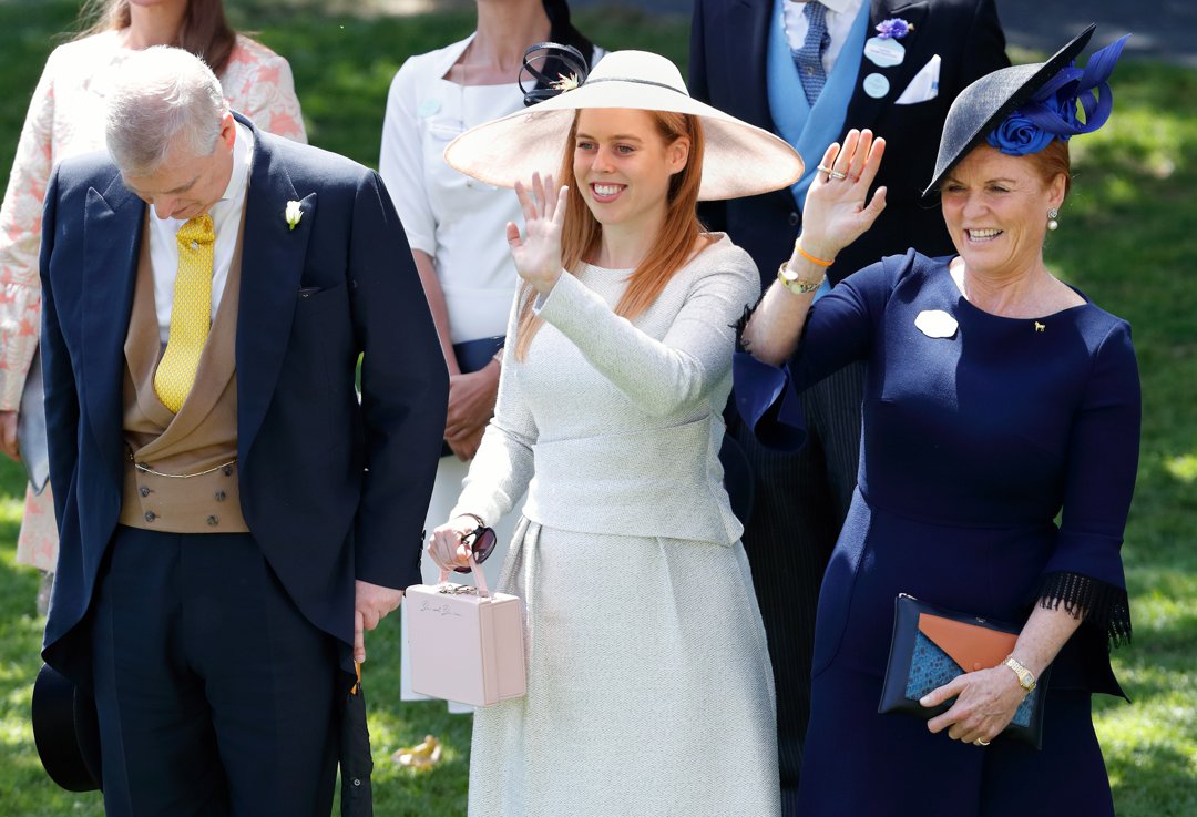 Prince Andrew, Duke of York bows his head whilst Princess Beatrice and Sarah, Duchess of York wave to Queen Elizabeth II as she and her guests pass by in horse drawn carriages on day 4 of Royal Ascot at Ascot Racecourse on 22 June 2018 in Ascot, England. | Source: Getty Images