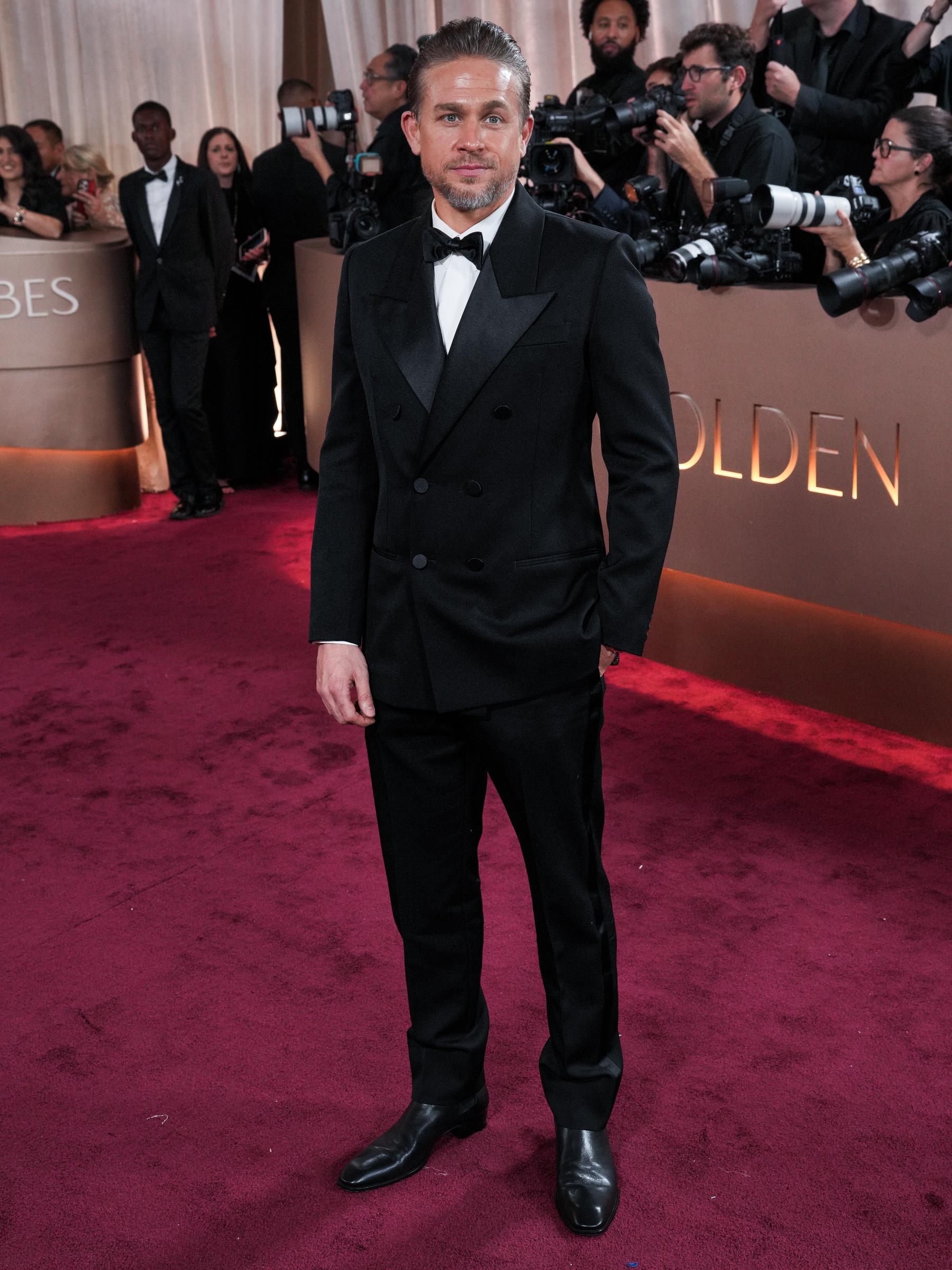 Charlie Hunnam Brings Old-School Cool to the Red Carpet: Arriving at the 83rd Annual Golden Globes in a sleek black tuxedo, Charlie Hunnam embodied refined masculinity. With every camera flash, the actor's undeniable charm and classic style reminded fans why he remains a Hollywood favourite.