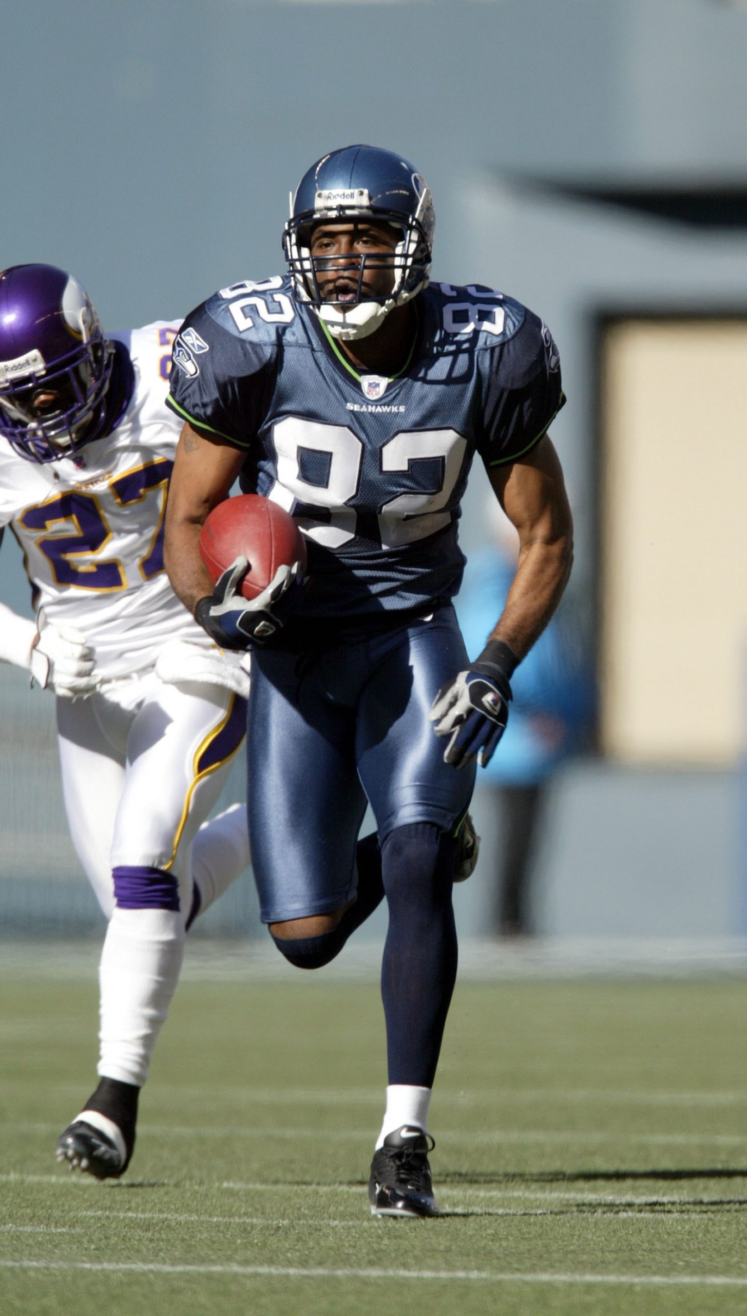 Wide receiver for the Seattle Seahawks evades cornerback for the Minnesota Vikings during the game at Qwest Field on October 22, 2006 | Source: Getty Images