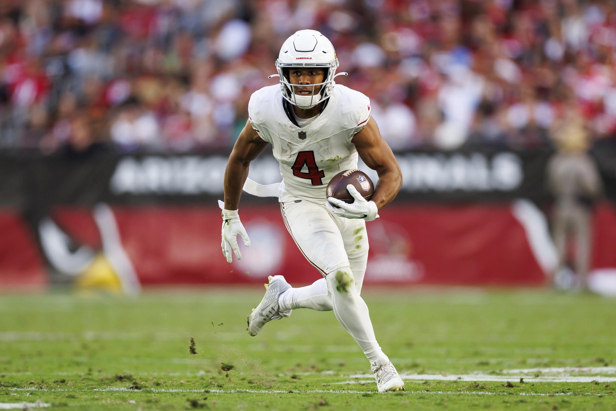 Rondale Moore of the Arizona Cardinals runs the ball after a catch during an NFL football game against the San Francisco 49ers at State Farm Stadium on December 17, 2023, in Glendale, Arizona | Source: Getty Images