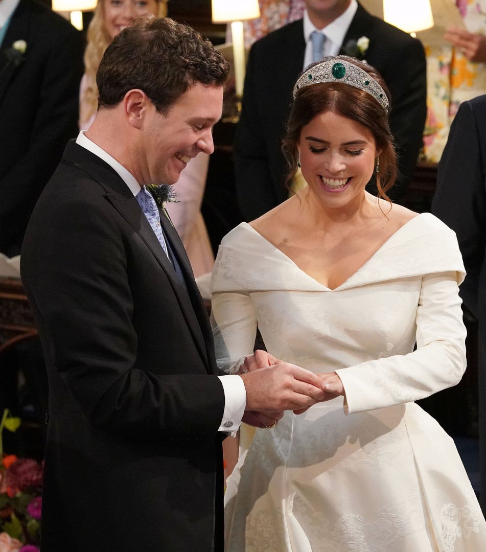 Jack Brooksbank and Princess Eugenie of York exchange rings during their wedding ceremony at St. George's Chapel on October 12, 2018 in Windsor, England. | Source: Getty Images
