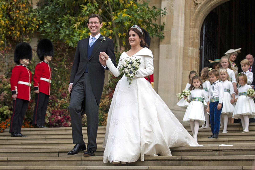 Princess Eugenie of York and Jack Brooksbank leave St George's Chapel in Windsor Castle following their wedding on 12 October 2018 in Windsor, England. | Source: Getty Images
