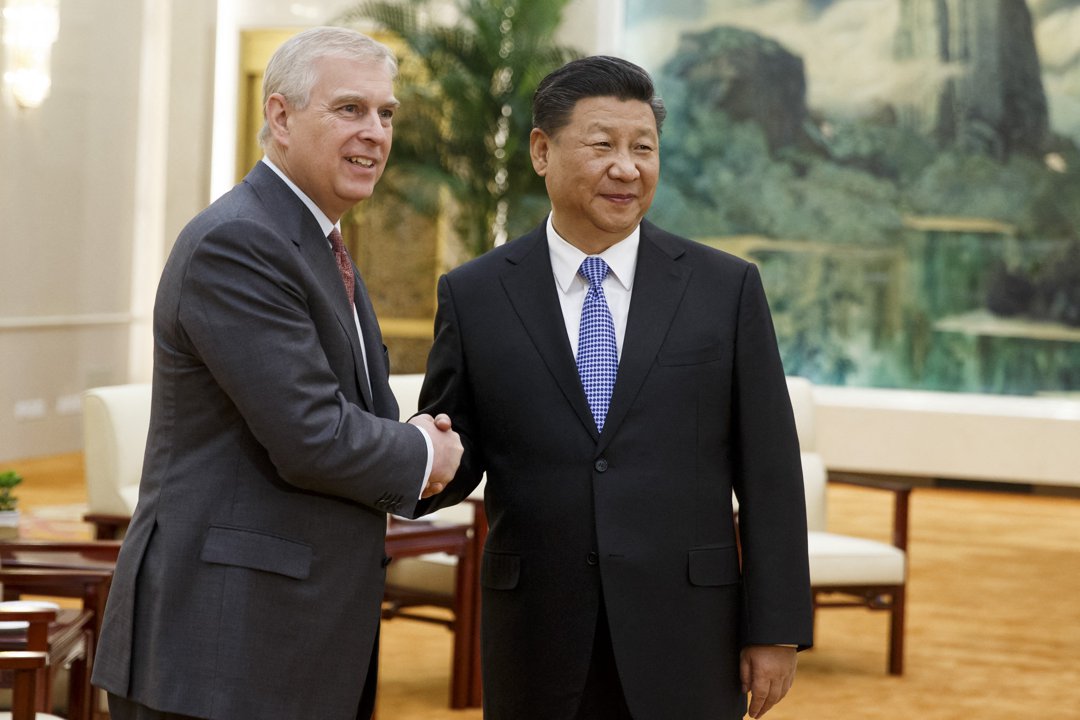 Andrew Mountbatten-Windsor and Xi Jinping shake hands at the Great Hall of the People on May 29, 2018, in Beijing, China. | Source: Getty Images