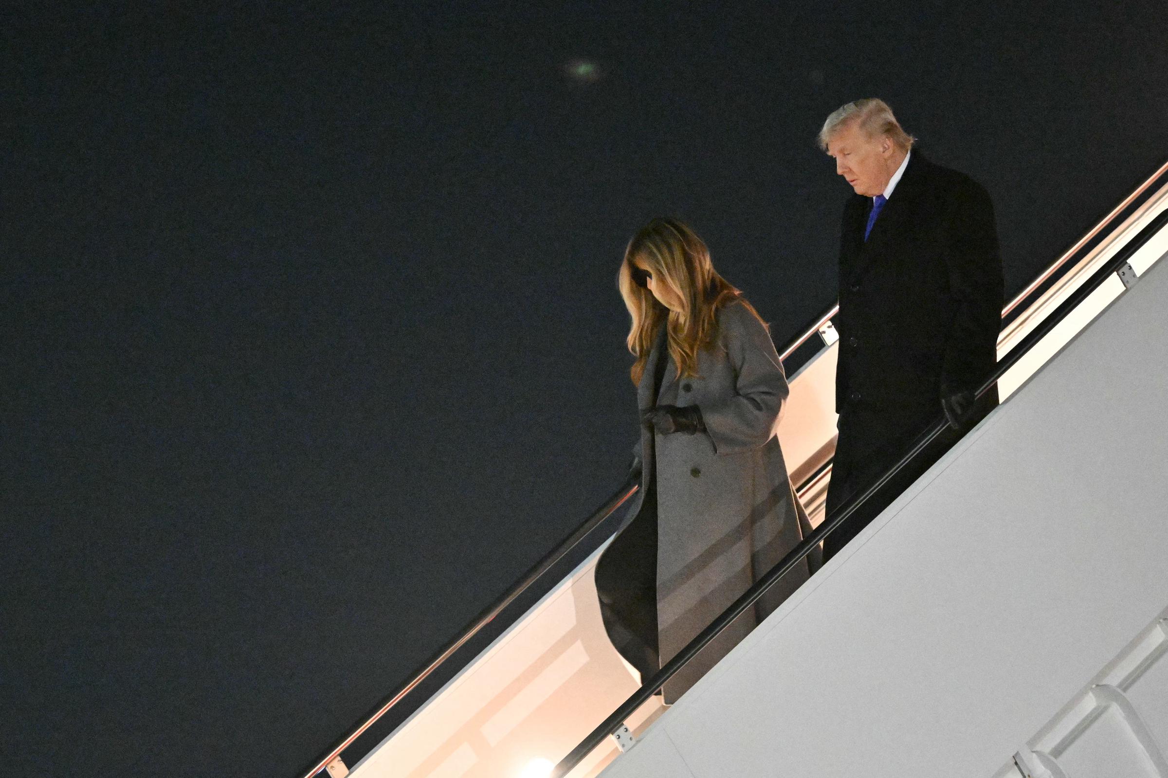 Donald Trump and Melania Trump step off Air Force One upon arrival at Joint Base Andrews in Maryland on February 16, 2026 | Source: Getty Images