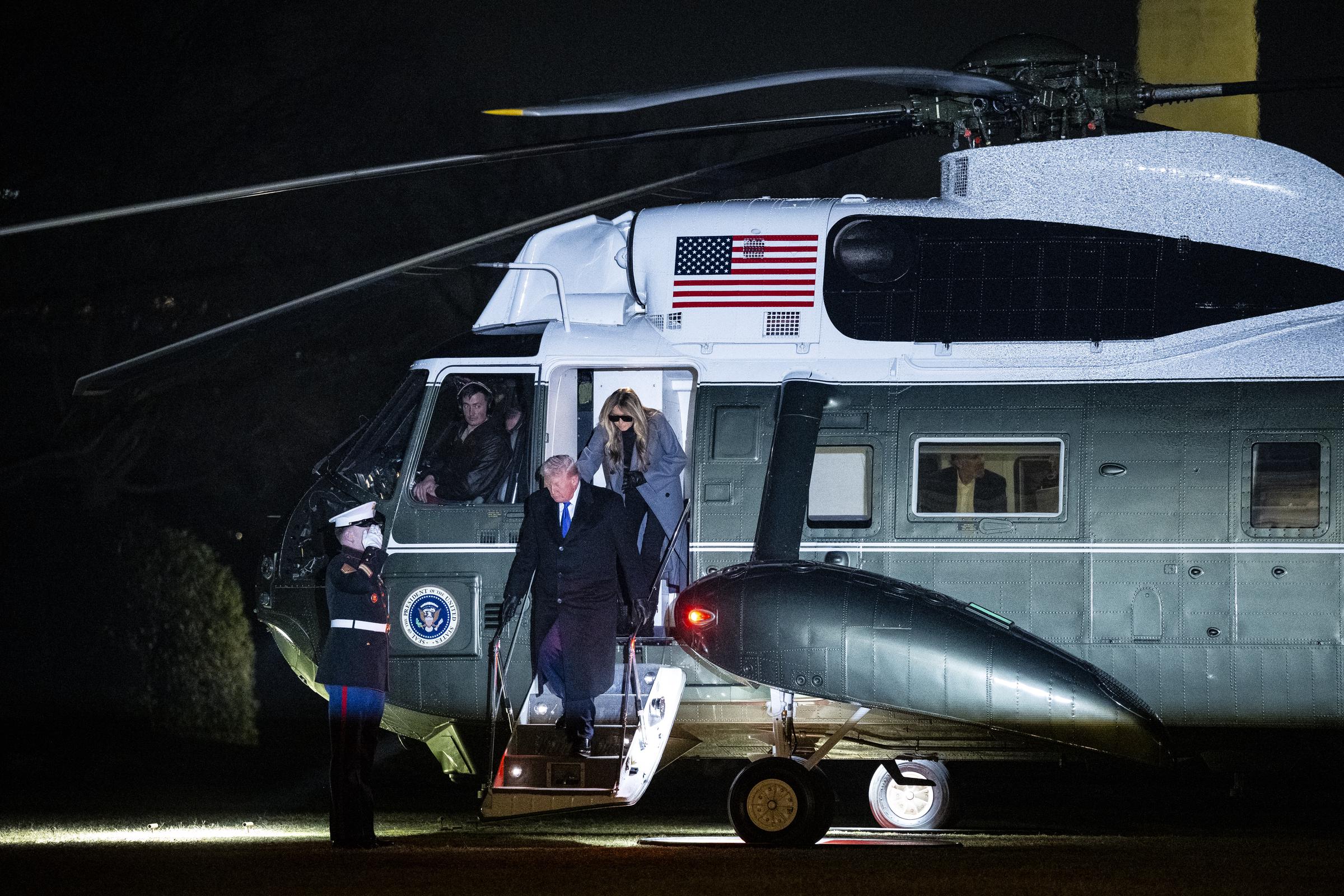 Donald Trump and Melania Trump exit Marine One on the South Lawn after returning to the White House on February 16, 2026, in Washington, DC | Source: Getty Images