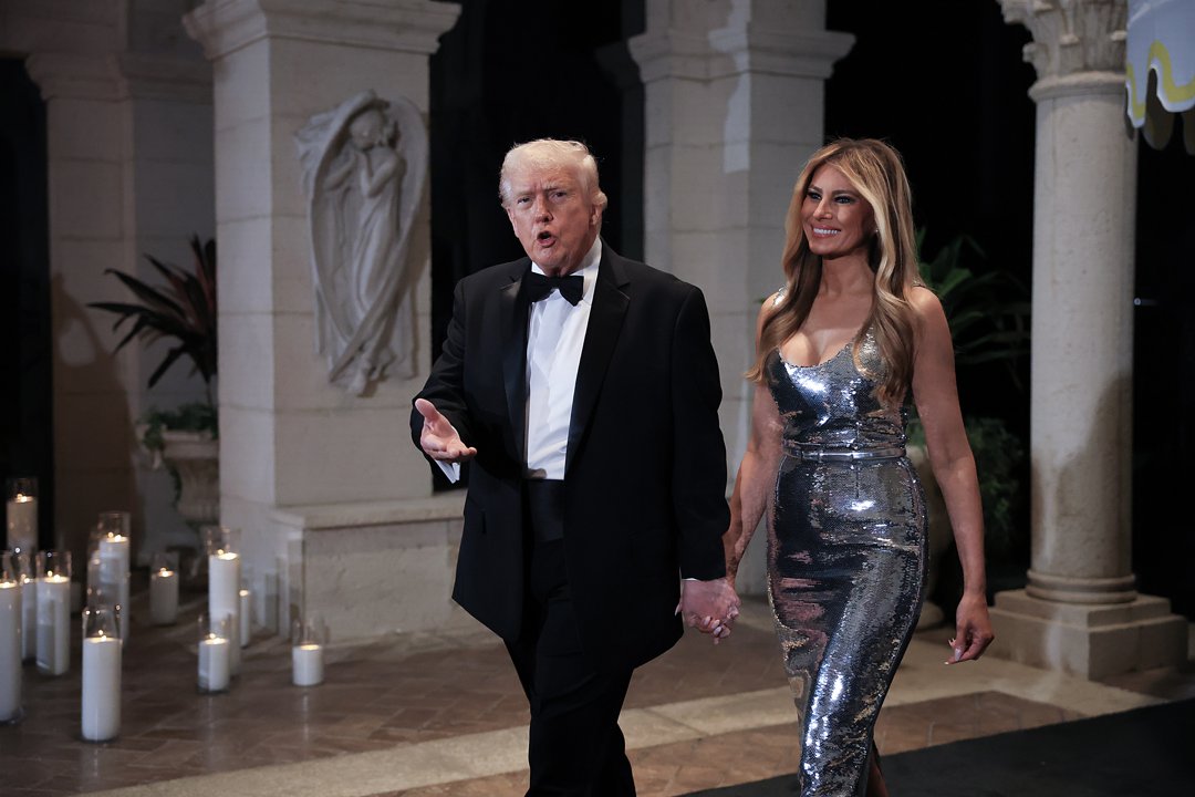 Donald Trump and Melania Trump arrive for a New Year&rsquo;s Eve event at Mar-a-Lago on December 31, 2025, in Palm Beach, Florida | Source: Getty Images