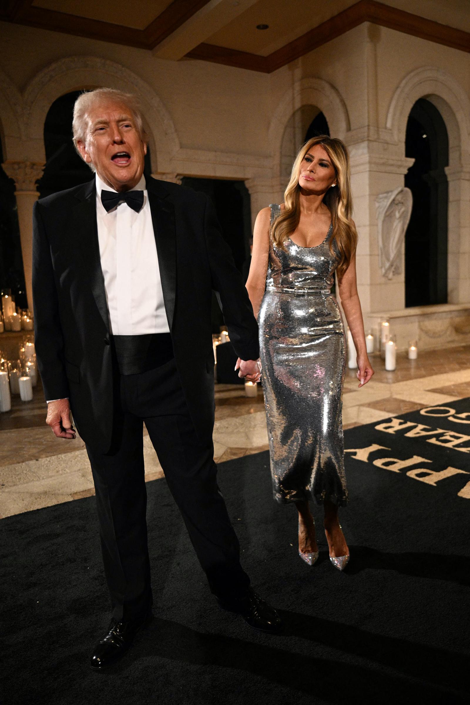 Donald Trump and Melania Trump arrive for a New Year&rsquo;s Eve event at Mar-a-Lago on December 31, 2025, in Palm Beach, Florida | Source: Getty Images