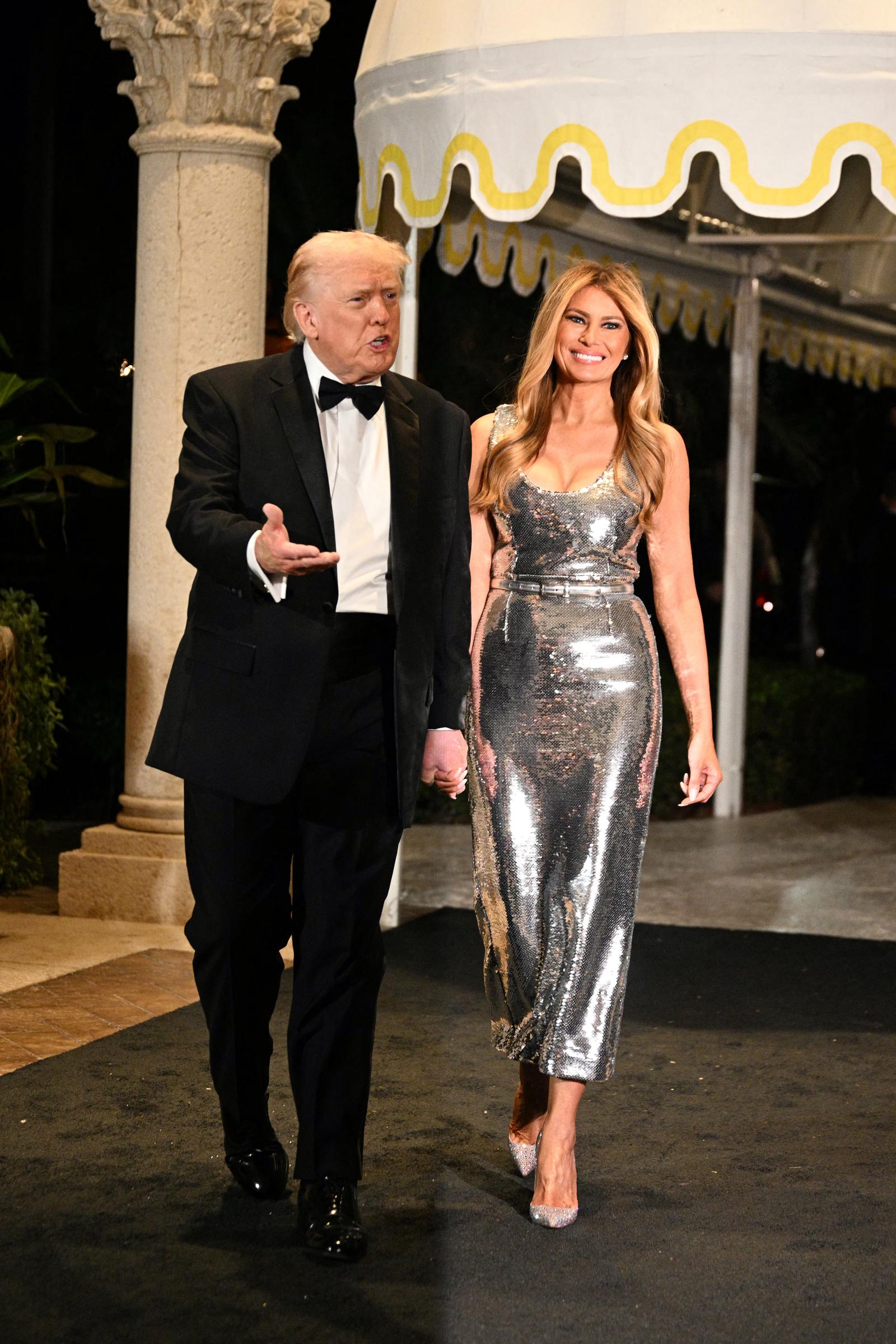Donald Trump and Melania Trump arrive for a New Year&rsquo;s Eve event at Mar-a-Lago on December 31, 2025, in Palm Beach, Florida | Source: Getty Images