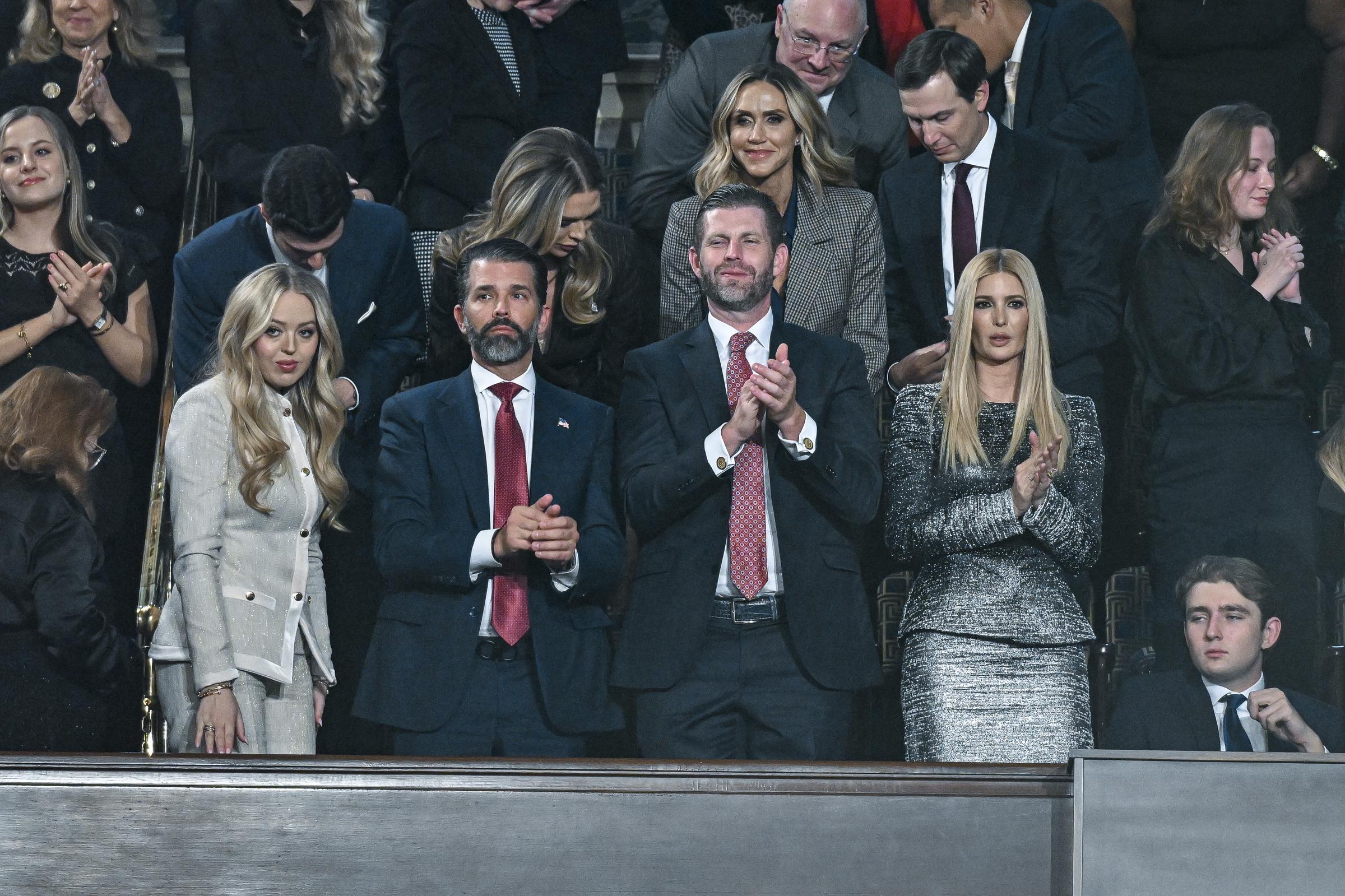 Members of the Trump family stand and applaud during the State of the Union address at the U.S. Capitol on February 24, 2026 | Source: Getty Images