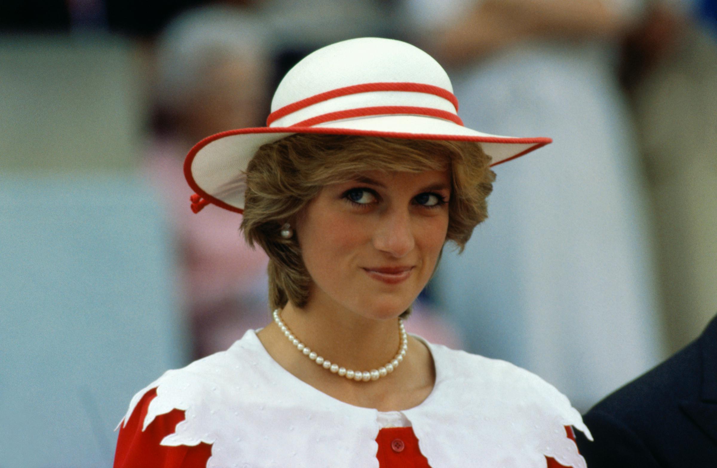 Diana, Princess of Wales, wears an outfit in the colors of Canada during a state visit to Edmonton in 1983 | Source: Getty Images