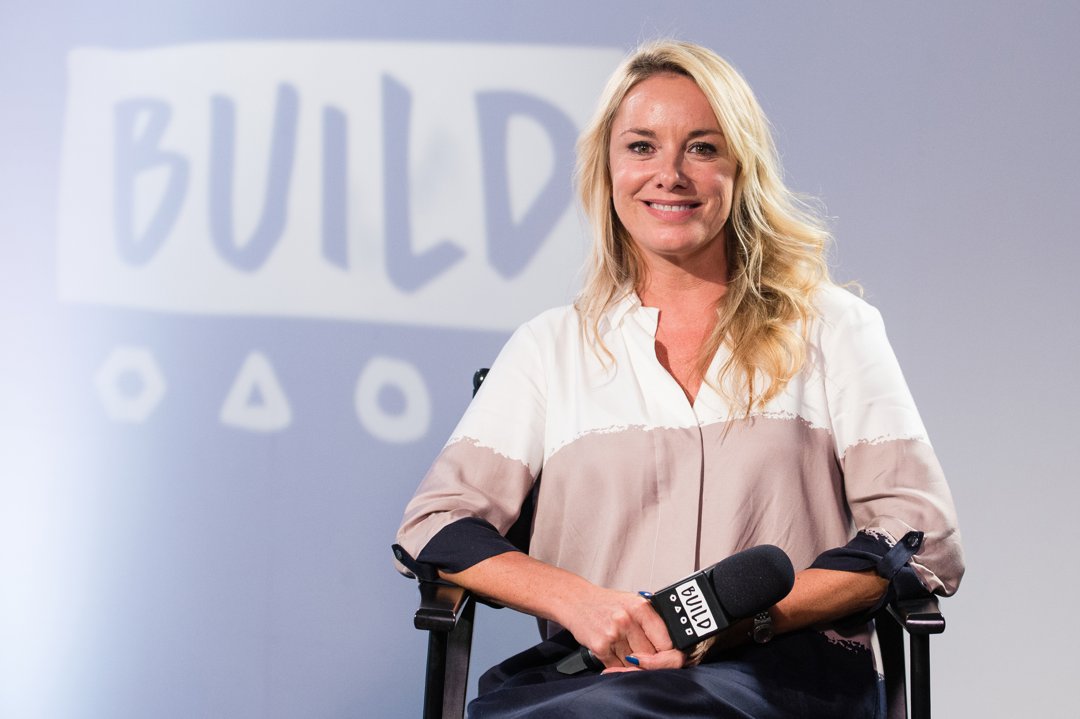 Tamzin Outhwaite appeared relaxed and approachable during a BUILD event in London on July 20, 2017, as she sat on stage discussing her work and career. Dressed in a soft, loose-fitting blouse with her hair worn down, the actress projected an easy confidence, offering a more candid, behind-the-scenes glimpse of her public life during a period when her focus remained firmly on craft rather than appearance.