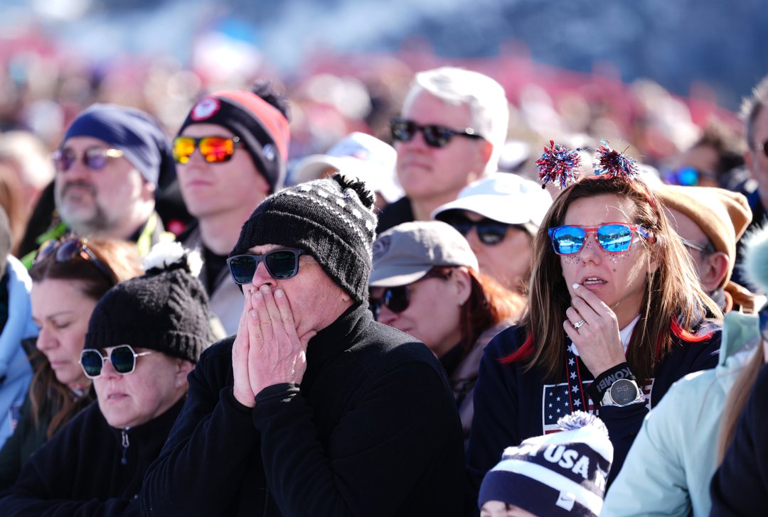 Fans reacts after watching Lindsey Vonn crashing out during the Women's Alpine Downhill Skiing at the Milano Cortina 2026 Winter Olympics in Italy on February 8. | Source: Getty Images