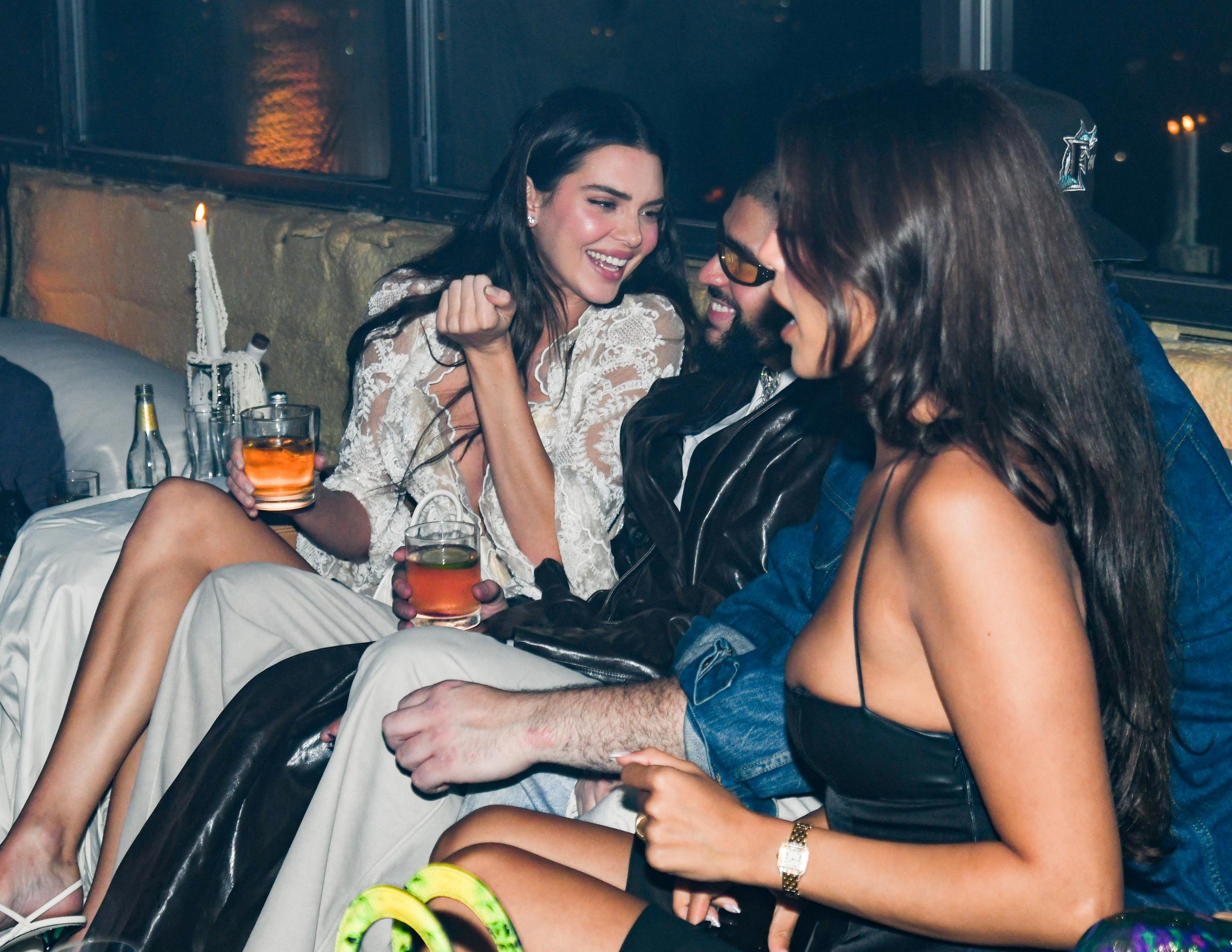 Kendall Jenner and Bad Bunny sharing a moment with other guests at the Apr&egrave;s Met 2 Met Gala After Party in New York on May 6, 2024. | Source: Getty Images
