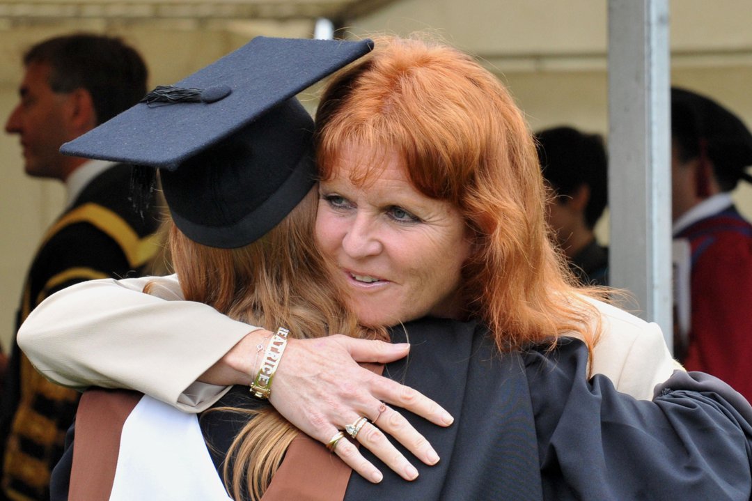Sarah Ferguson and Princess Beatrice in an embrace following the princess's graduation ceremony at Goldsmiths College in London, England, on September 9, 2011. | Source: Getty Images