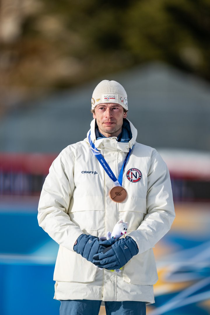 Bronze Medalist Sturla Holm L&aelig;greid of Team Norway during the medal ceremony for the Men 20km Individual on Day 4 of the Milano Cortina 2026 Winter Olympic Games on February 10 in Antholz-Anterselva, Italy. | Source: Getty Images