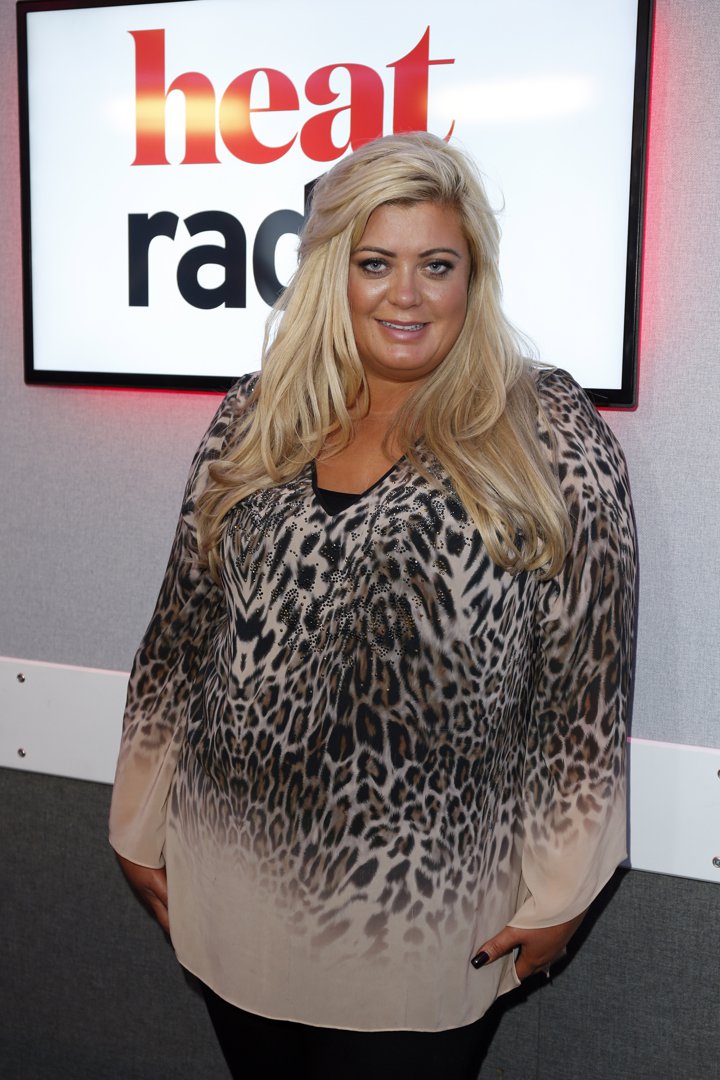 Gemma Collins posed for photos during a visit to Heat Radio in London on November 10, 2015, wearing a bold leopard print blouse and her signature voluminous hair. Just weeks after being seen out in casual wear, Collins opted for a more polished look here, continuing to embrace her curves while building her media presence beyond reality television.