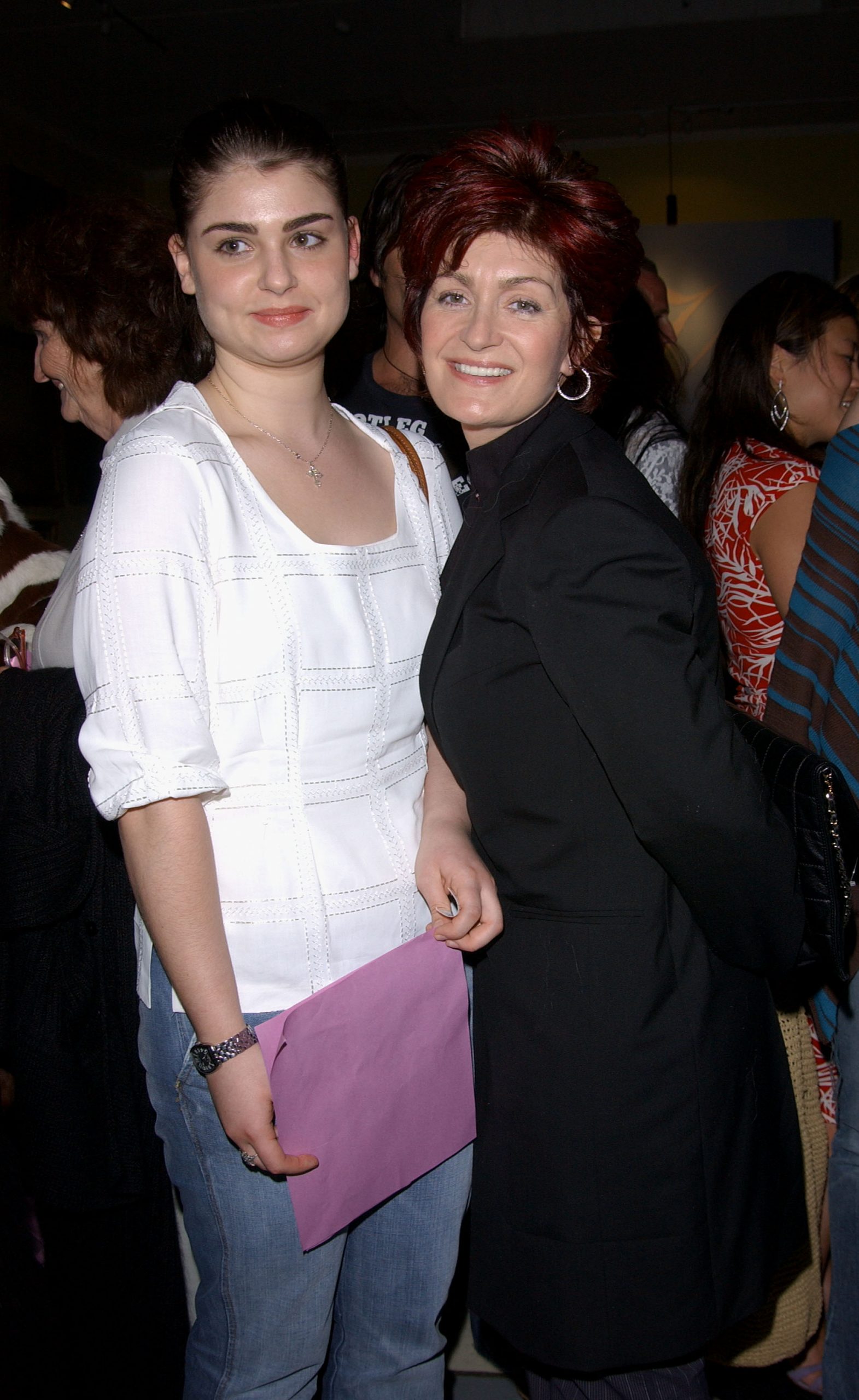 Sharon Osbourne and her daughter Aimee attend the V Fashion Show 13 April 2002 in Los Angeles, California. | Source: Getty Images
