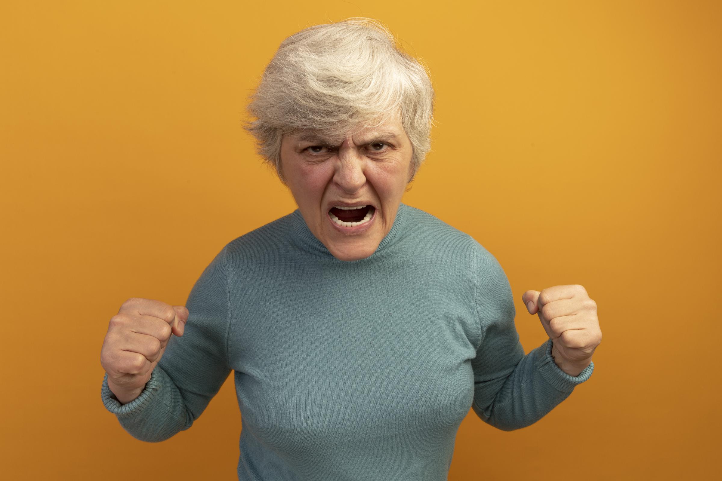 An angry woman shouting | Source: Freepik