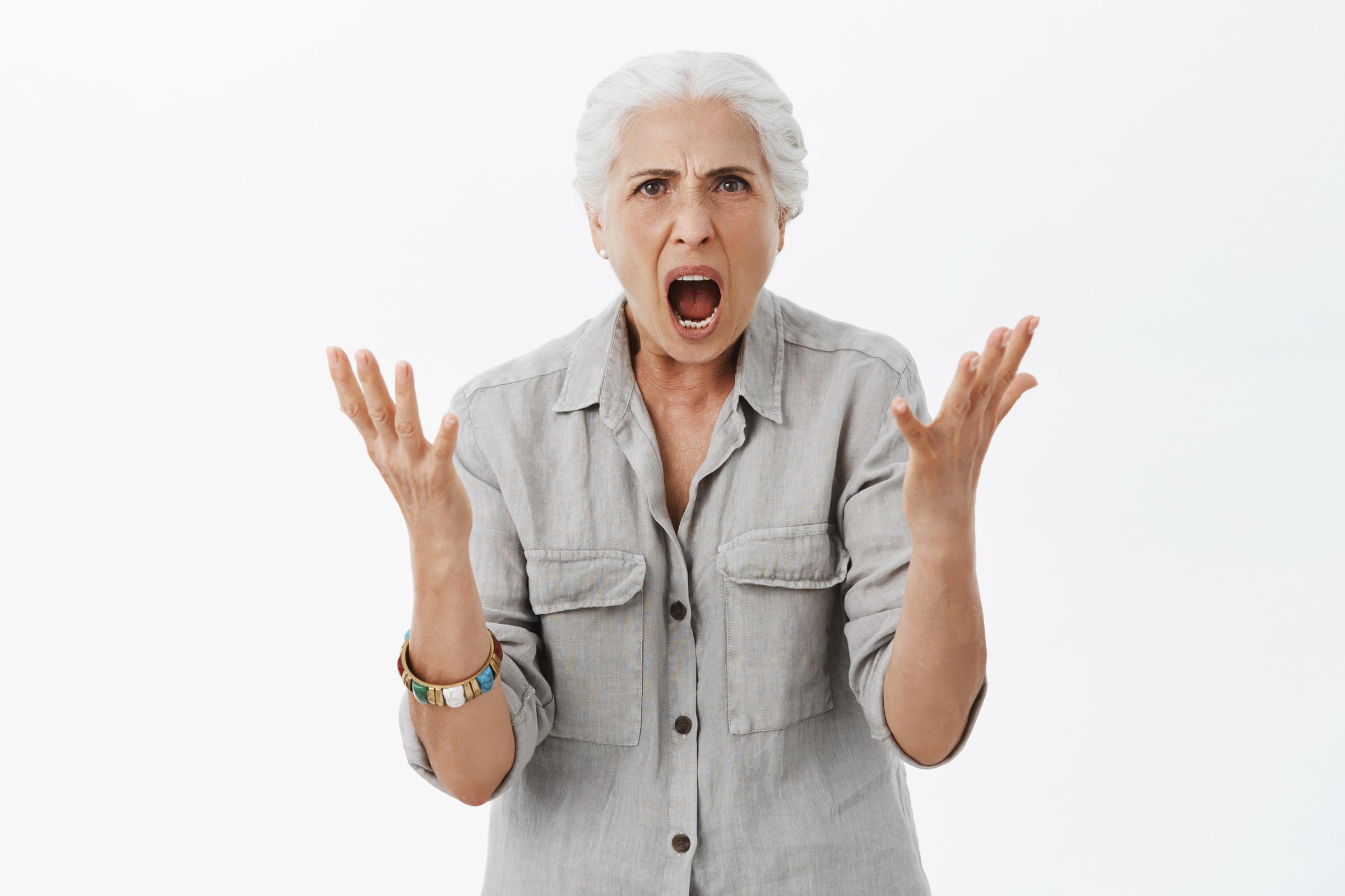 A woman shouting | Source: Freepik