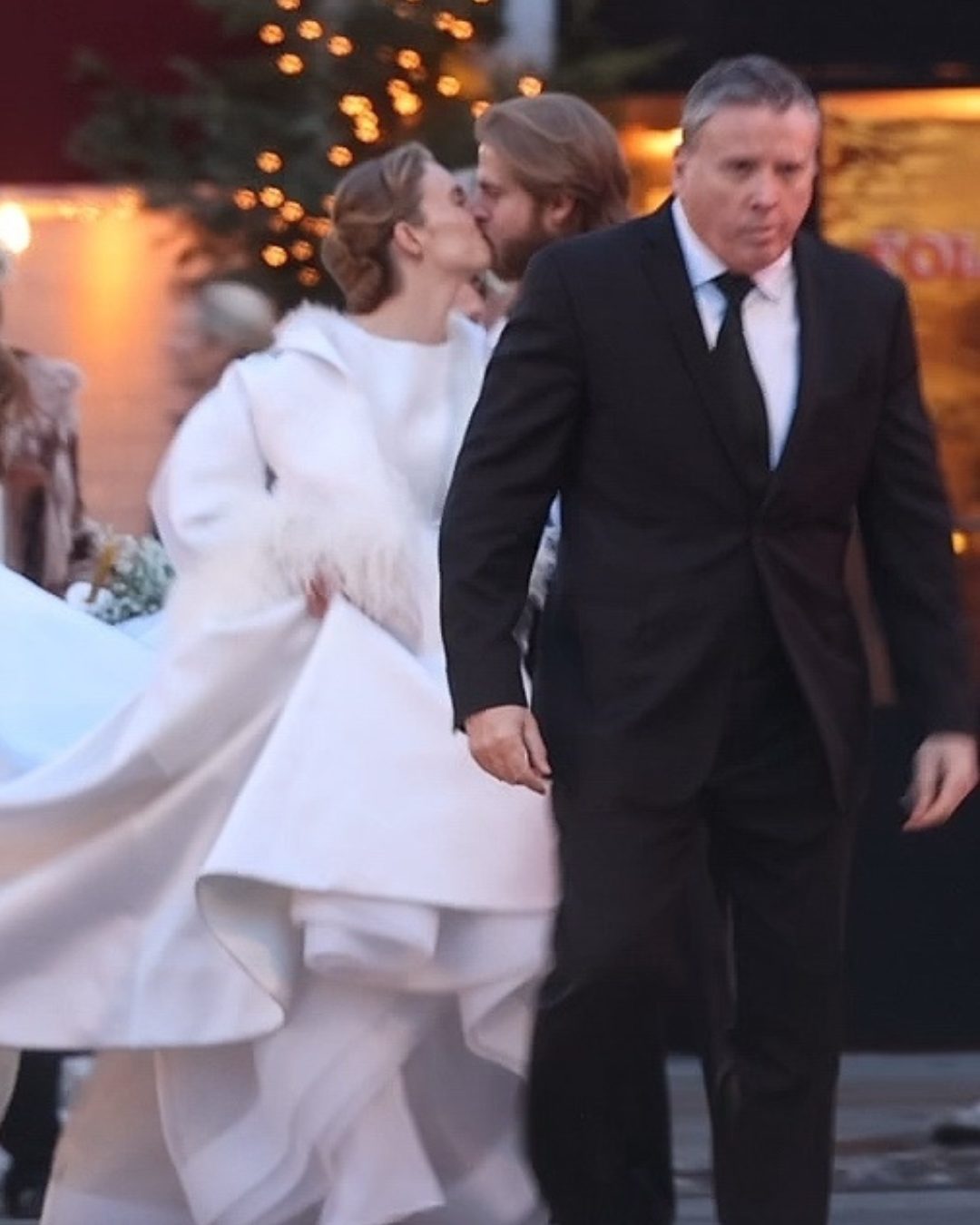 In the middle of a bustling street, Maya and Christian paused for a sweet kiss — and made it look like the final scene of a romance film. It was spontaneous, tender, and wholly cinematic — a bride and groom completely lost in love. | Source: Instagram/pagesix