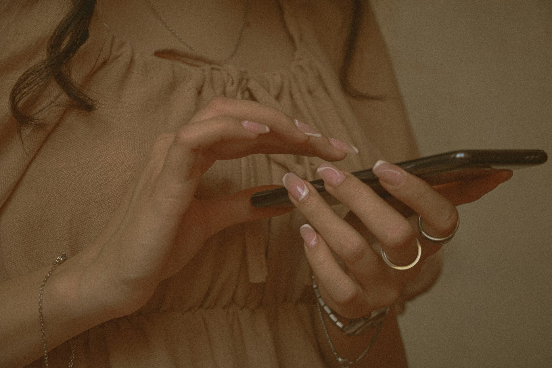 A woman using a phone | Source: Unsplash