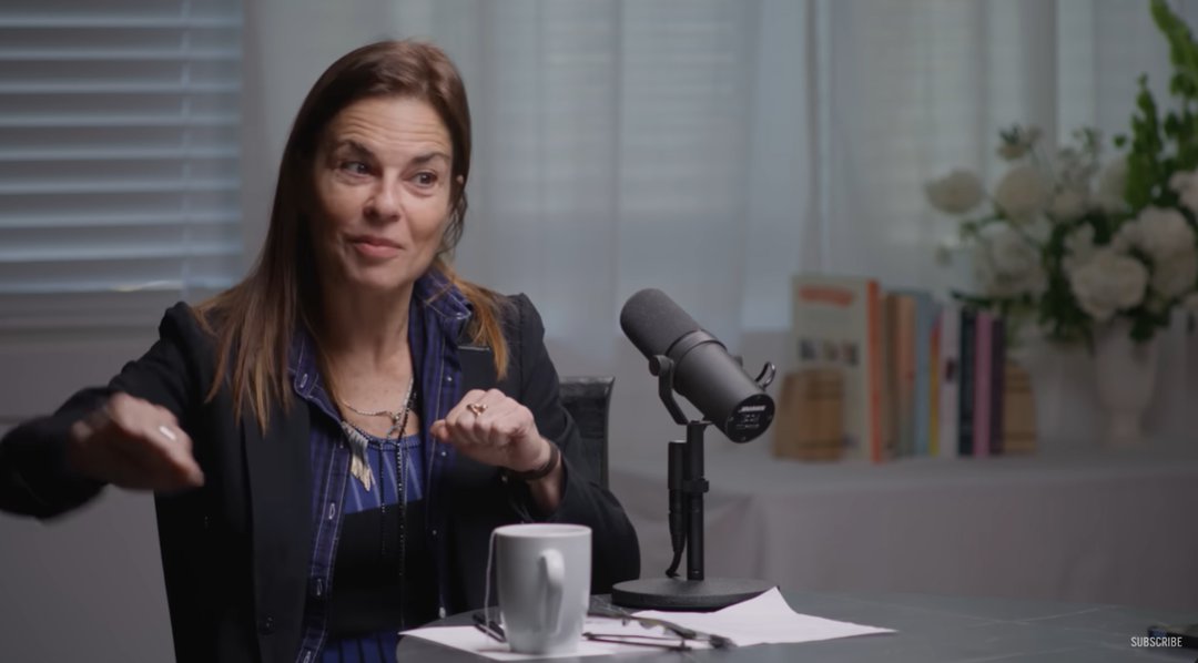 Dr. Guralnik gestures as she explores the deeper emotional layers behind everyday irritations between partners. | Source: YouTube/michelleobama