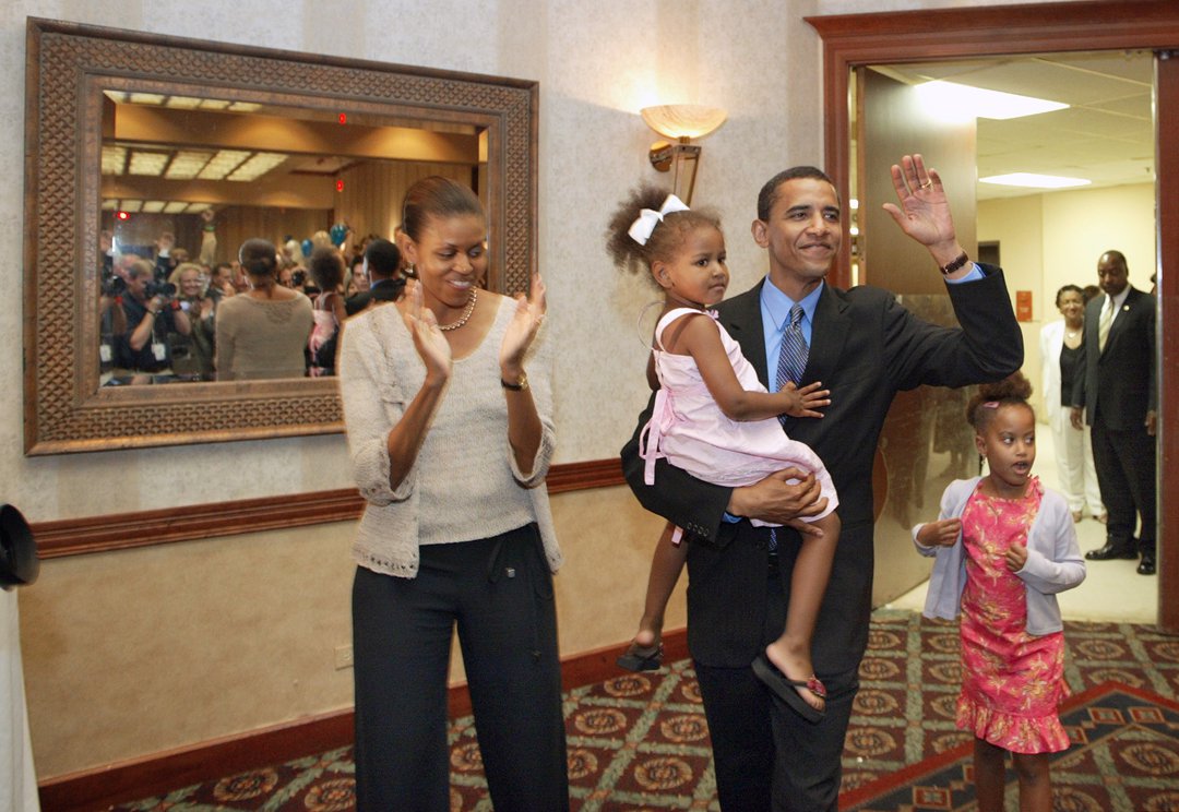 Barack Obama during a fundraiser with his wife Michelle Obama and daughters Sasha and Malia Obama for his 43rd birthday celebration in Matteson, Illinois on August 4, 2004. | Source: Getty Images