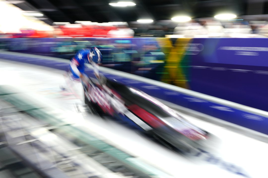 Elana Meyers Taylor races down the track during Heat 2 of the women's monobob competition at the Milano Cortina 2026 Winter Olympics in Italy | Source: Getty Images