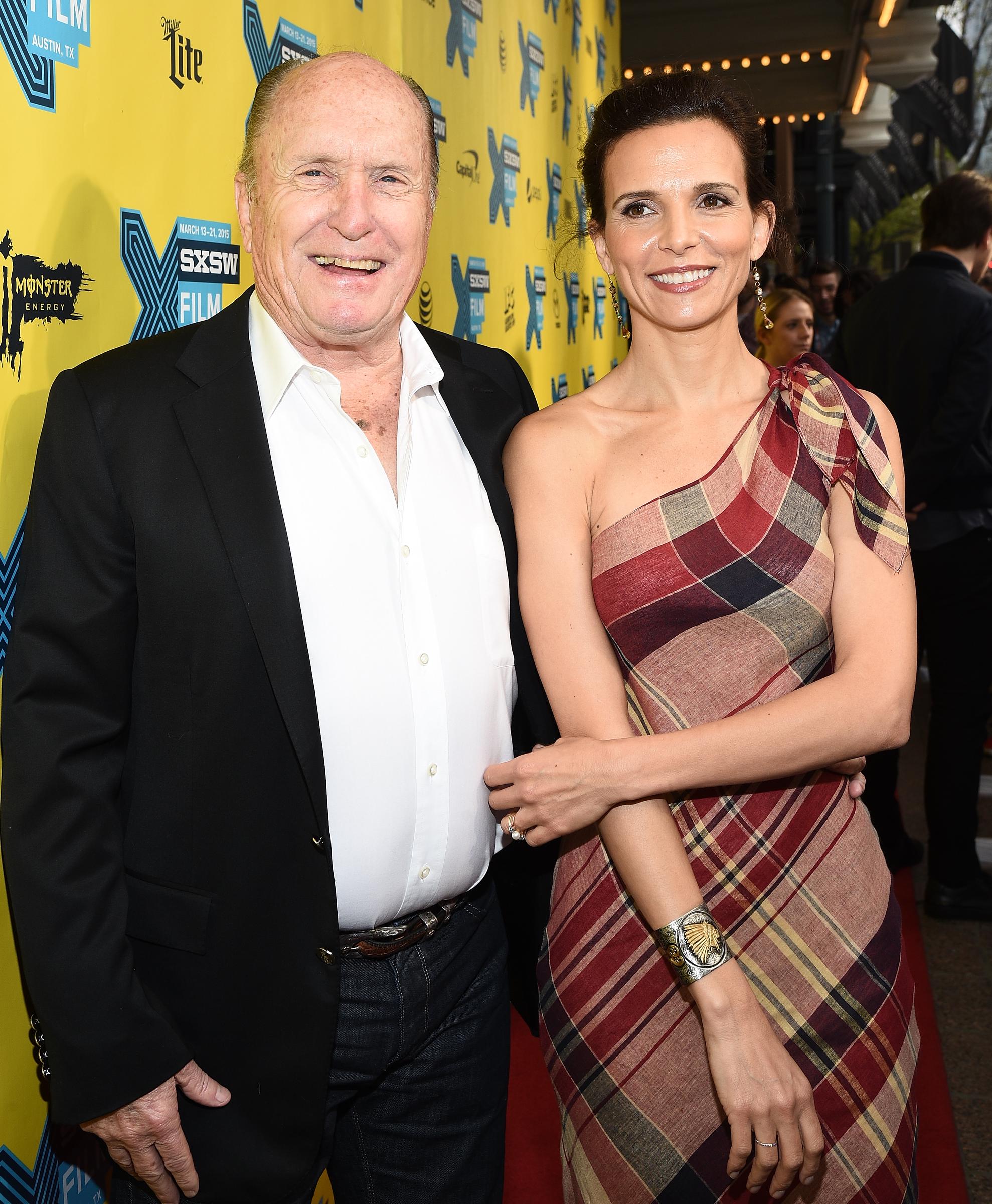 Robert and Luciana Duvall attend the premiere of 