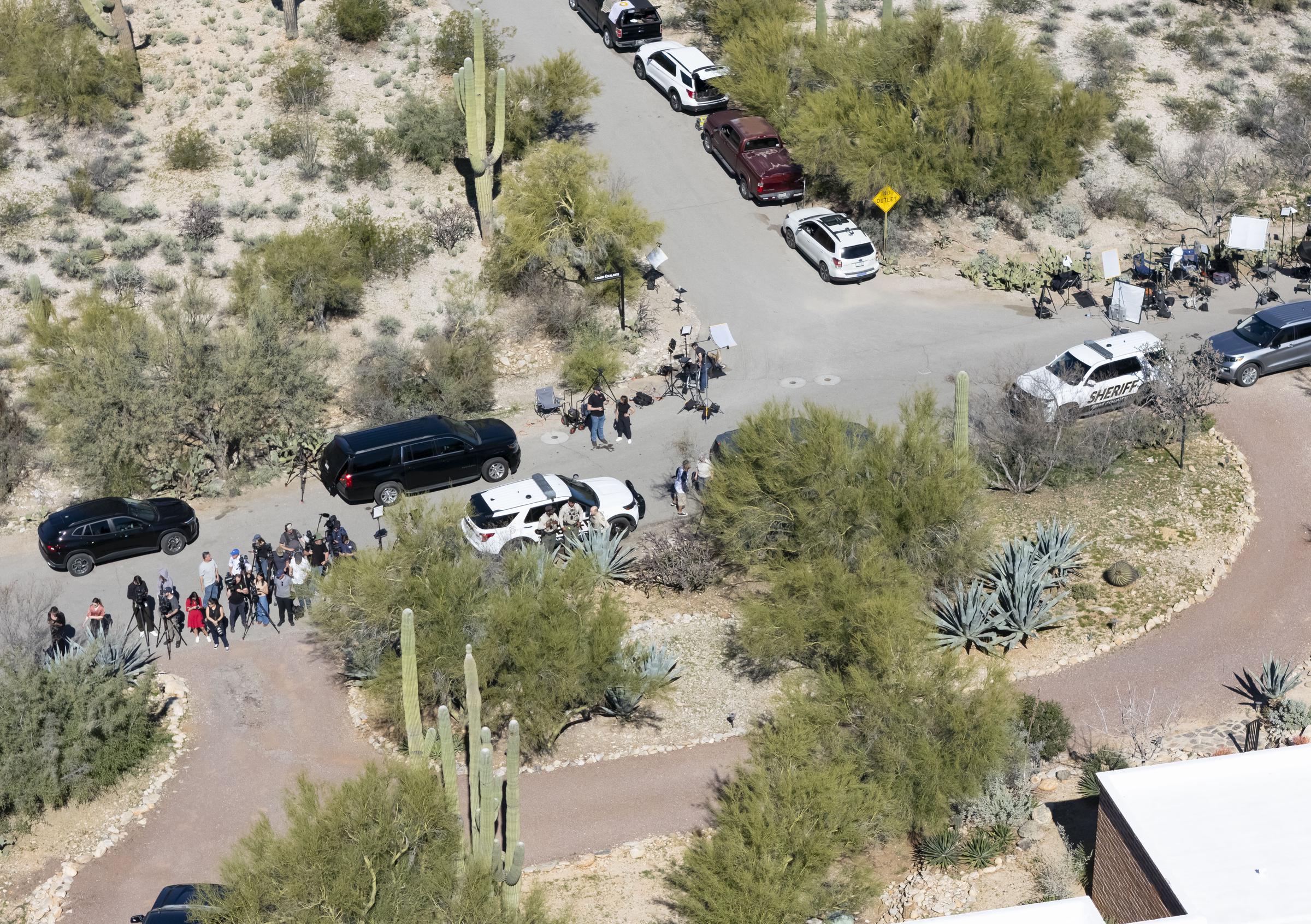 Overhead view of media stationed outside the home of Nancy Guthrie on February 8, 2026 | Source: Getty Images