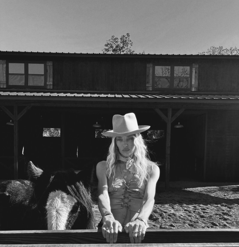 A black-and-white photo of  Janell Shirtcliff on her ranch. | Source: Instagram/janellshirtcliff
