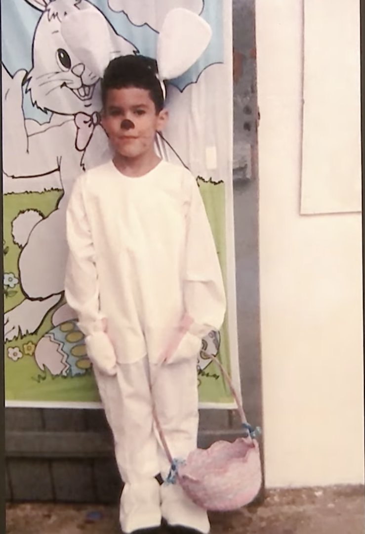 Benito Antonio Mart&iacute;nez Ocasio, aka, Bad Bunny wears a bunny costume while holding a basket, from a post dated February 28, 2020. | Source: YouTube/TheTonightShowStarringJimmyFallon