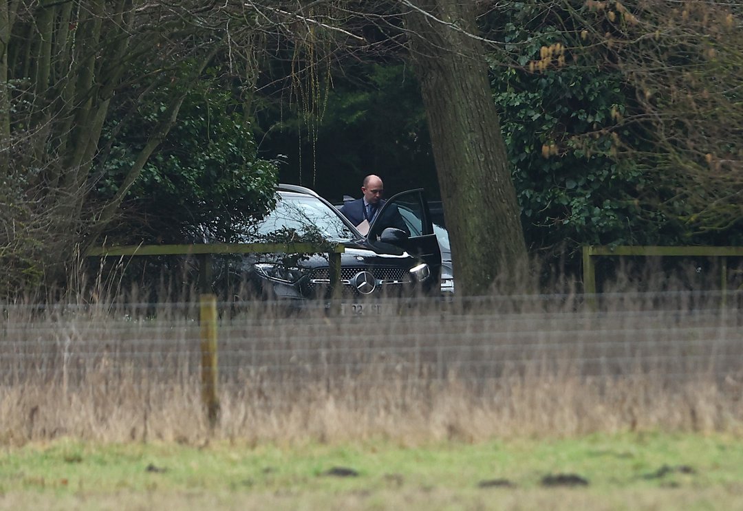 A man steps out of an umarked car at the home of Andrew Mountbatten-Windsor on 19 February 2026 in Sandringham, Norfolk. | Source: Getty Images