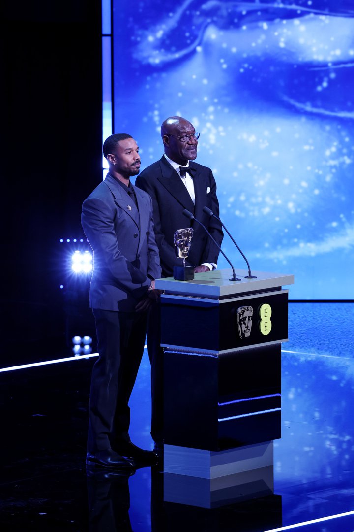 Michael B. Jordan and Delroy Lindo during the EE BAFTA Awards on February 22, 2026, in London, England. | Source: Getty Images