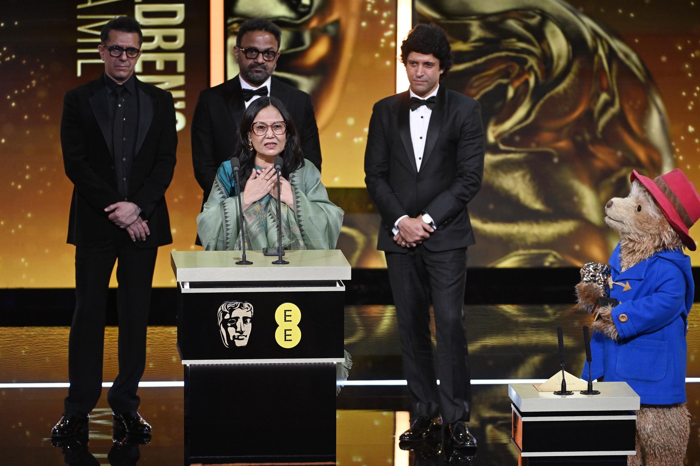 Ritesh Sidhwani, Alan McAlex, Farhan Akhtar, and Lakshmipriya Devi accept the Children's & Family Film Award for