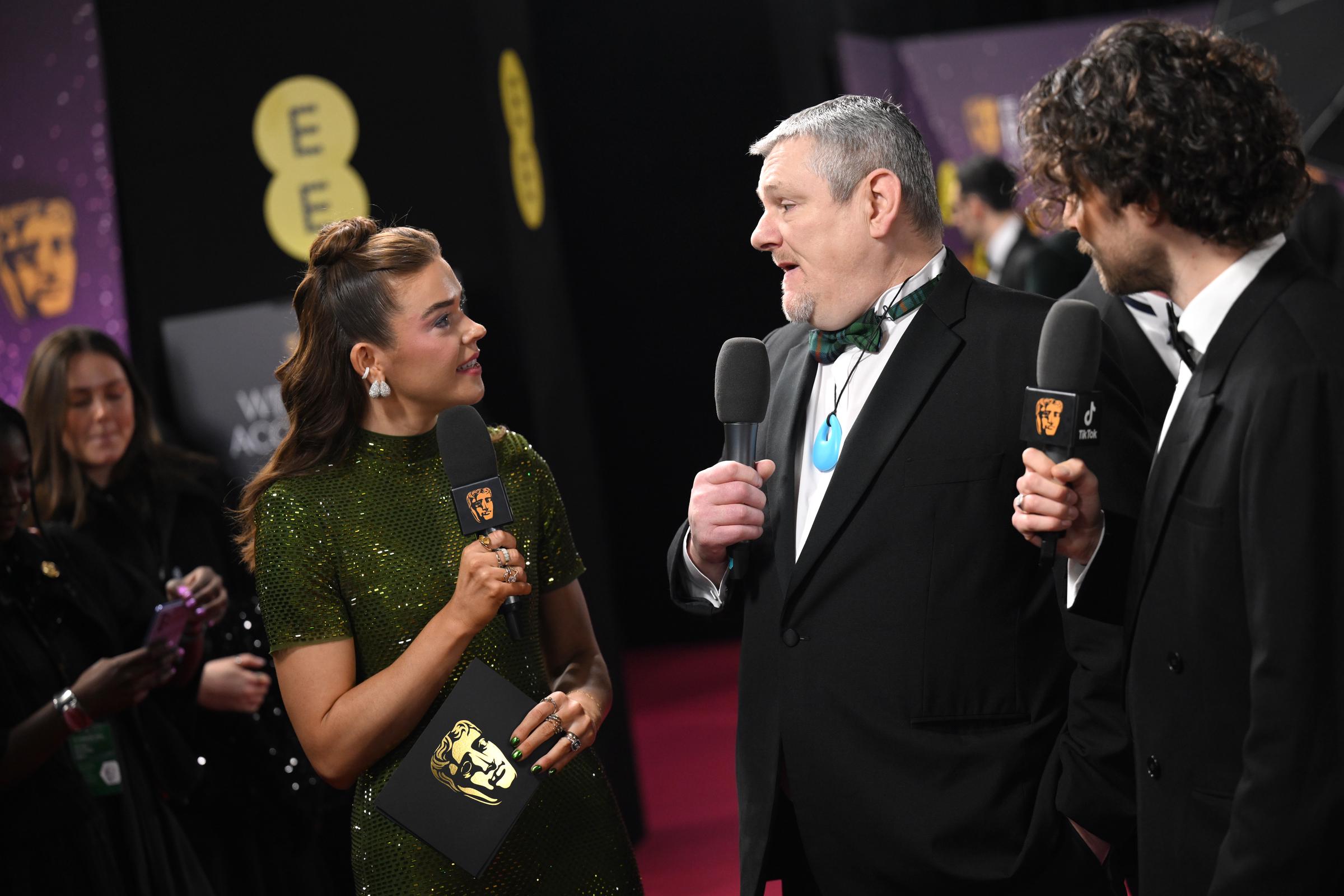 Hannah Townsend and John Davidson during the EE BAFTA Awards on February 22, 2026, in London, England. | Source: Getty Images