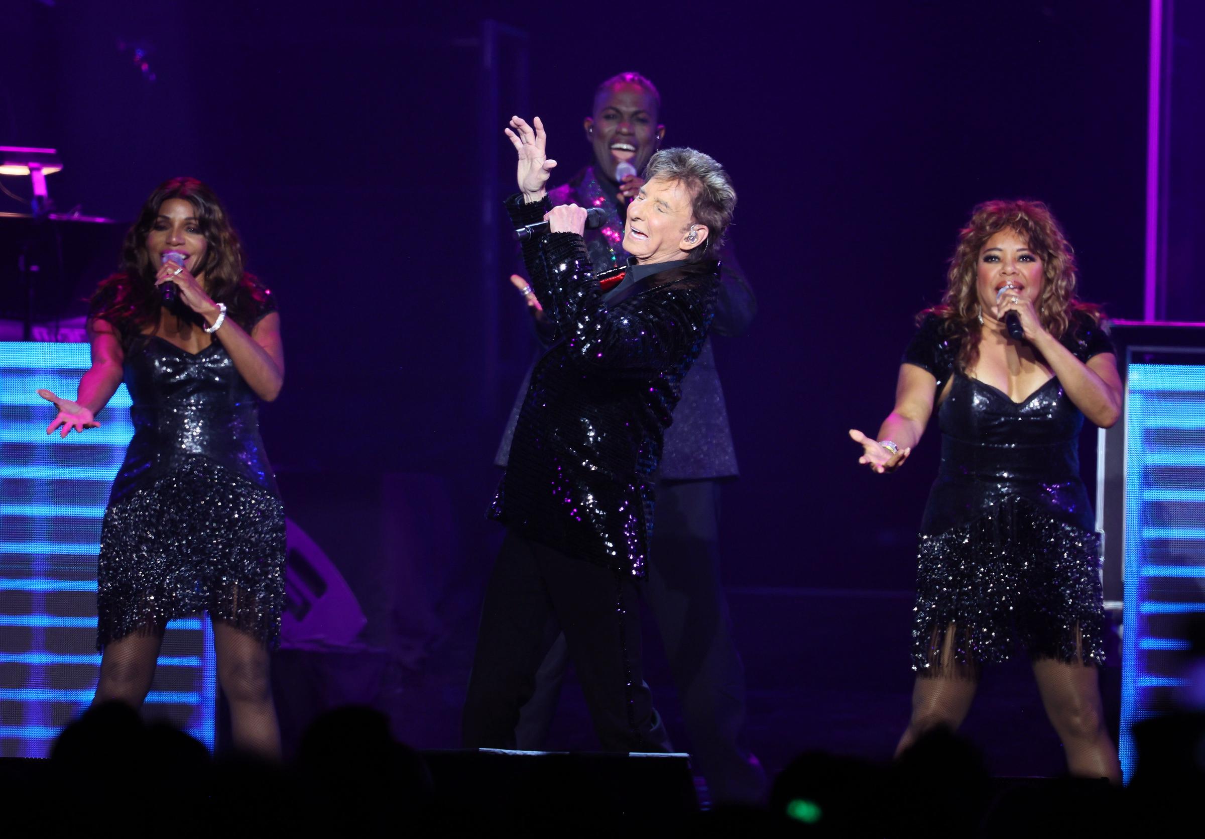 Barry Manilow performs on his 