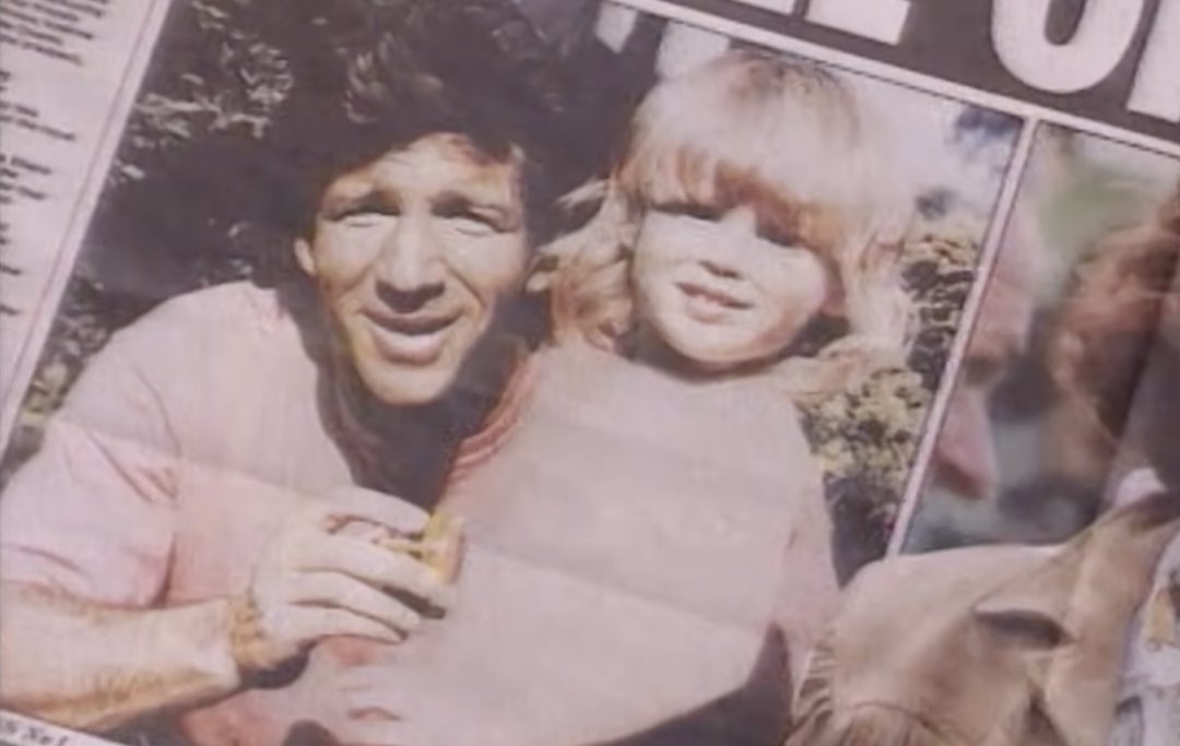 Steve Wyatt is pictured with a young girl in a newspaper snippet. | Source: YouTube/Real Royalty