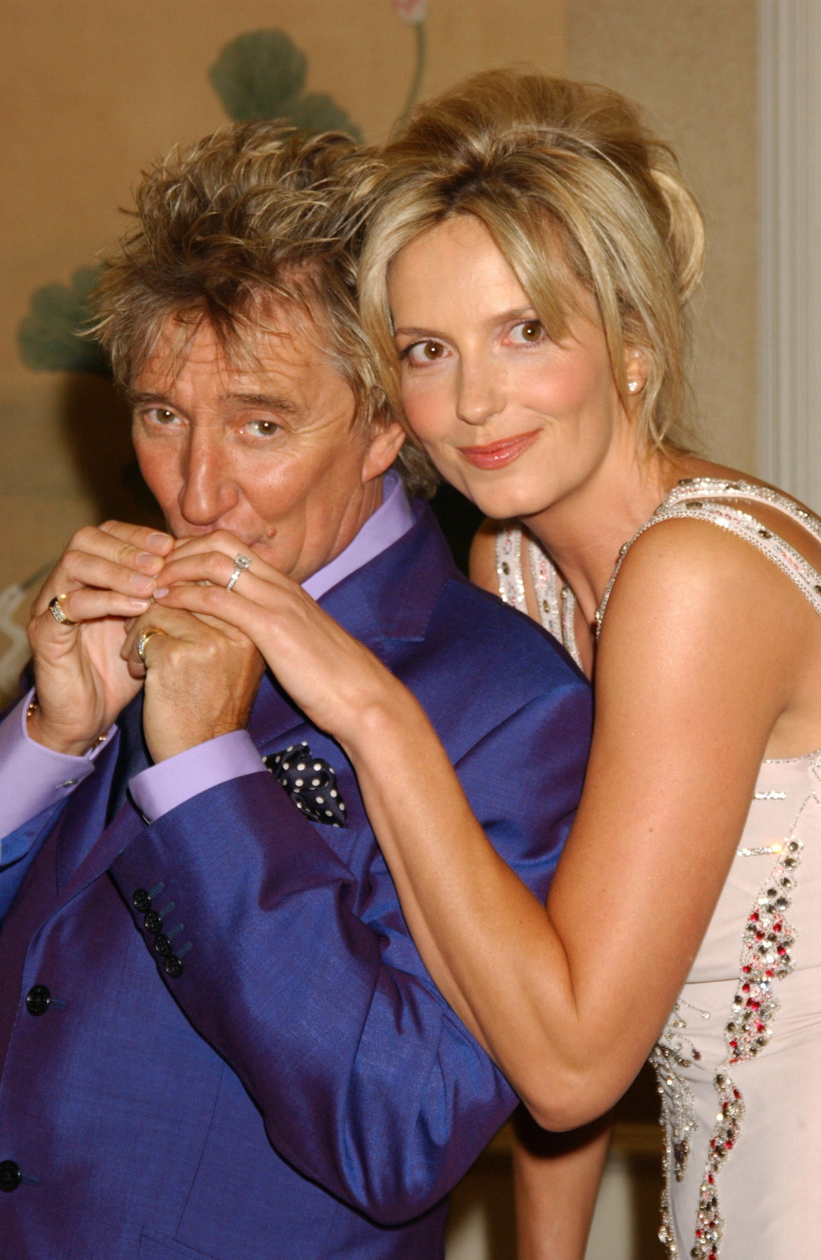 Singer Rod Stewart and actress Penny Lancaster pose after announcing their engagement at the Savoy Hotel on 12 March 2005 in London, England. | Source: Getty Images