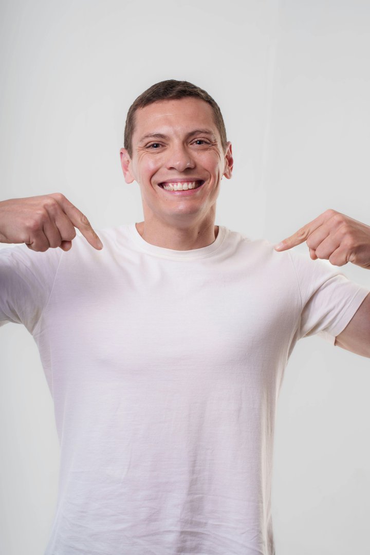 A happy man pointing at himself | Source: Pexels
