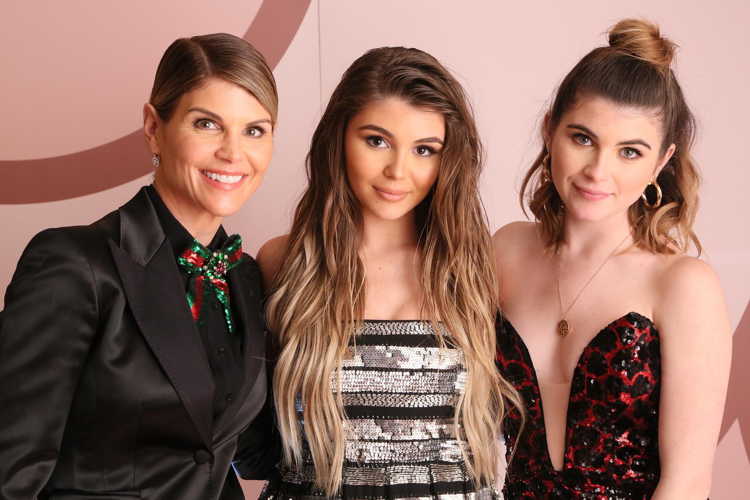 Proud mom Lori Loughlin joins daughters Olivia Jade and Isabella Rose Giannulli to celebrate their Sephora palette collaboration in West Hollywood.