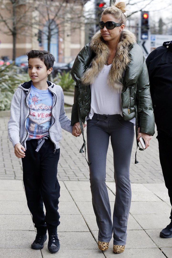 Katie Price arrives at the New Victoria Theatre with son Junior on 19 December 2015 in Woking, England. | Source: Getty Images