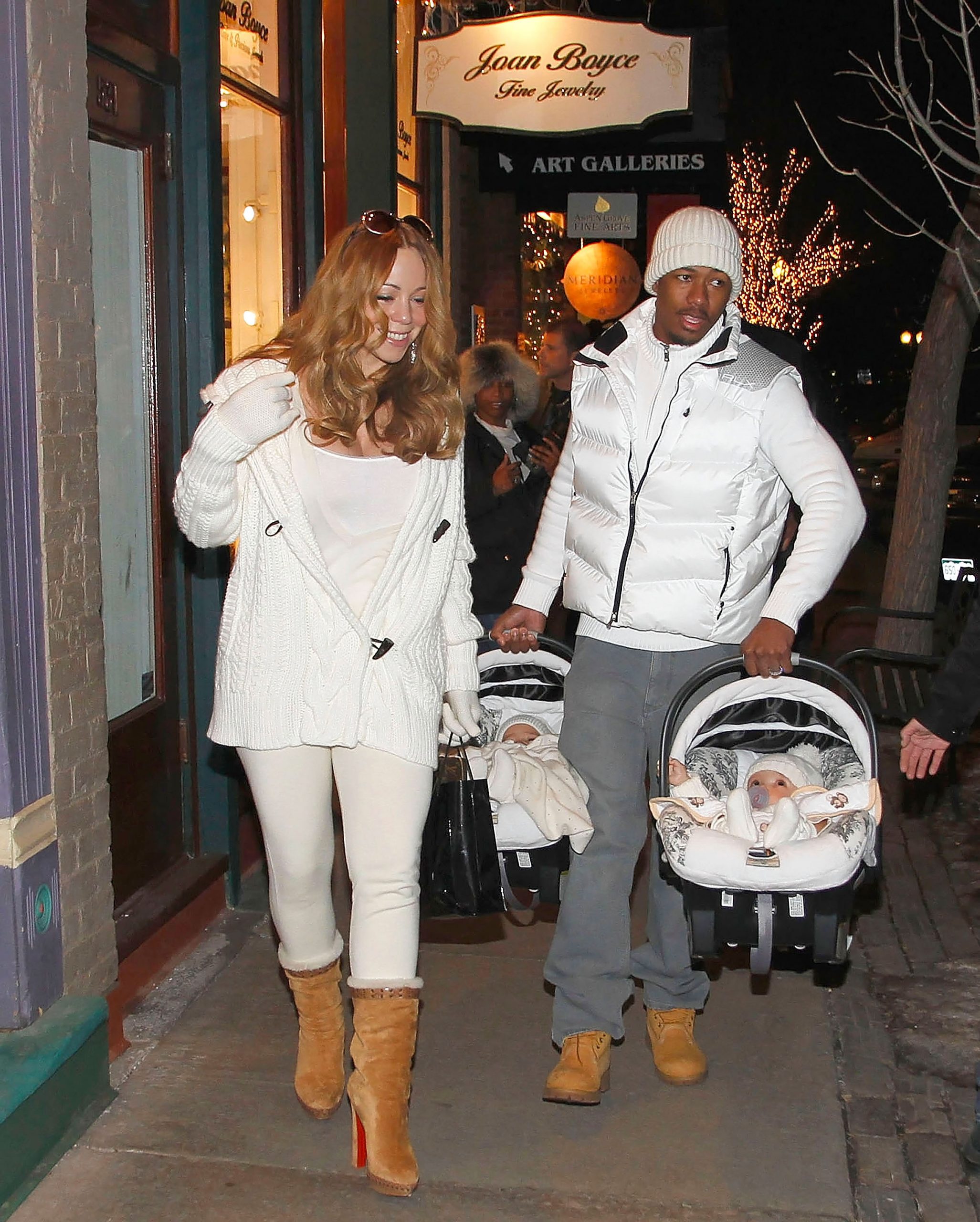 Mariah Carey and Nick Cannon are seen out with their twins, Moroccan Scott Cannon and Monroe Cannon, as they carry them in car seats through the streets of Aspen, Colorado, on December 31, 2011 | Source: Getty Images