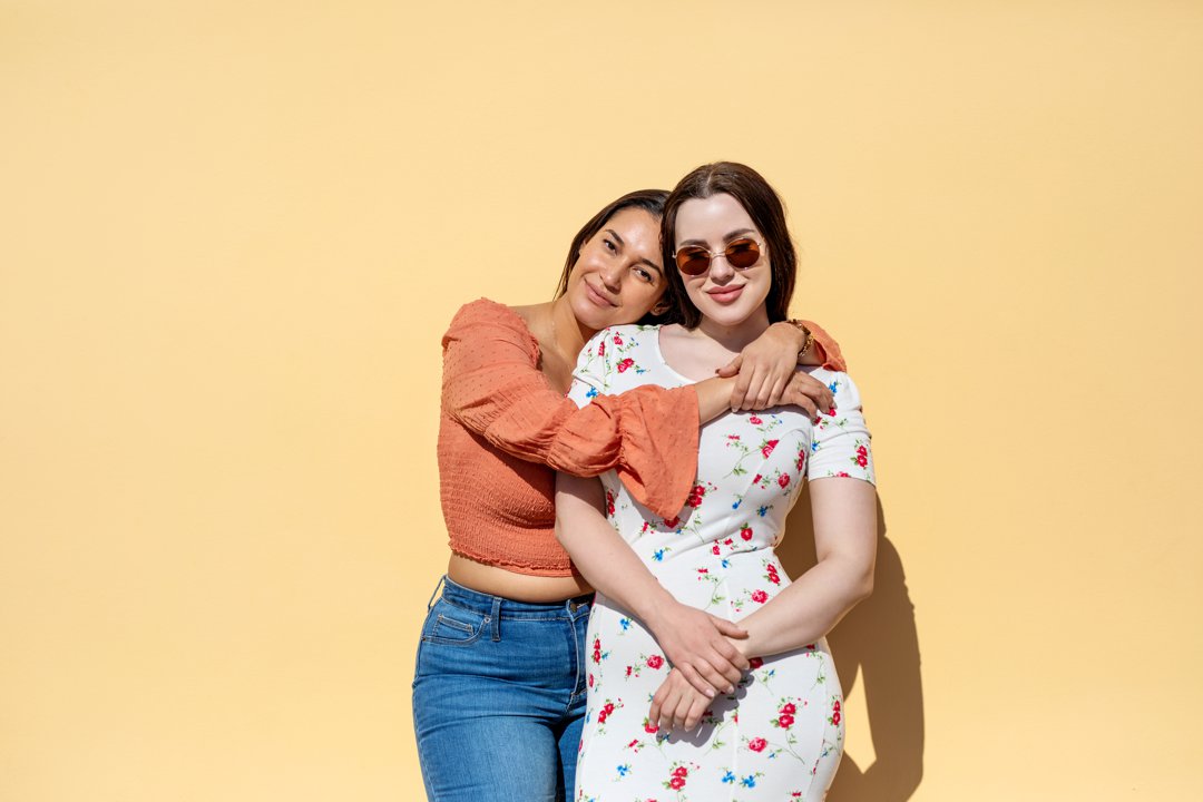 Portrait of beautiful female friends standing together | Source: Getty Images